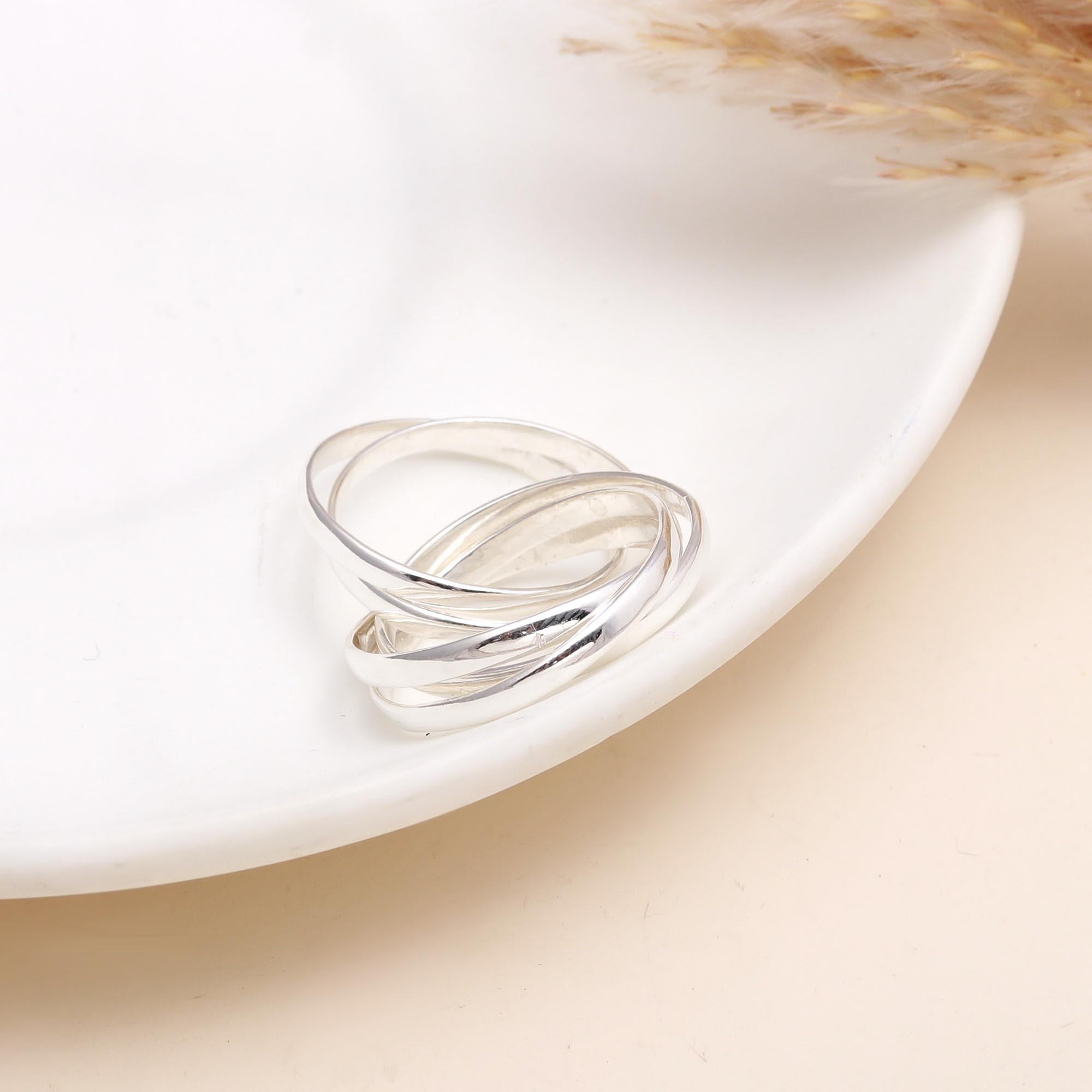 The Interlocking Trinity: Rolling Russian Wedding Ring