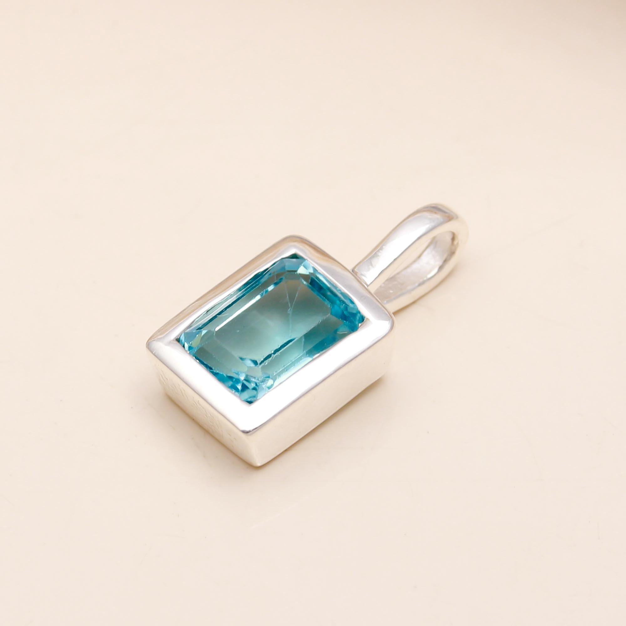 The Azure Prism: Blue Topaz Rectangular Silver Pendant