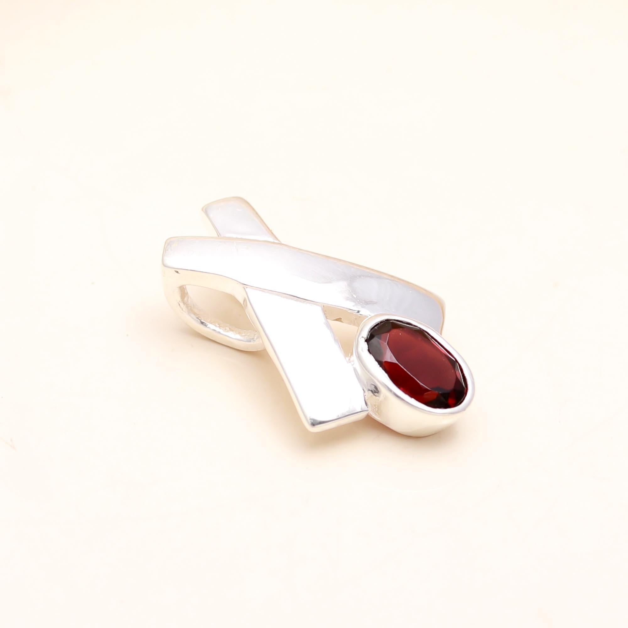The Crimson Ribbon: Abstract Garnet Wrap Charm