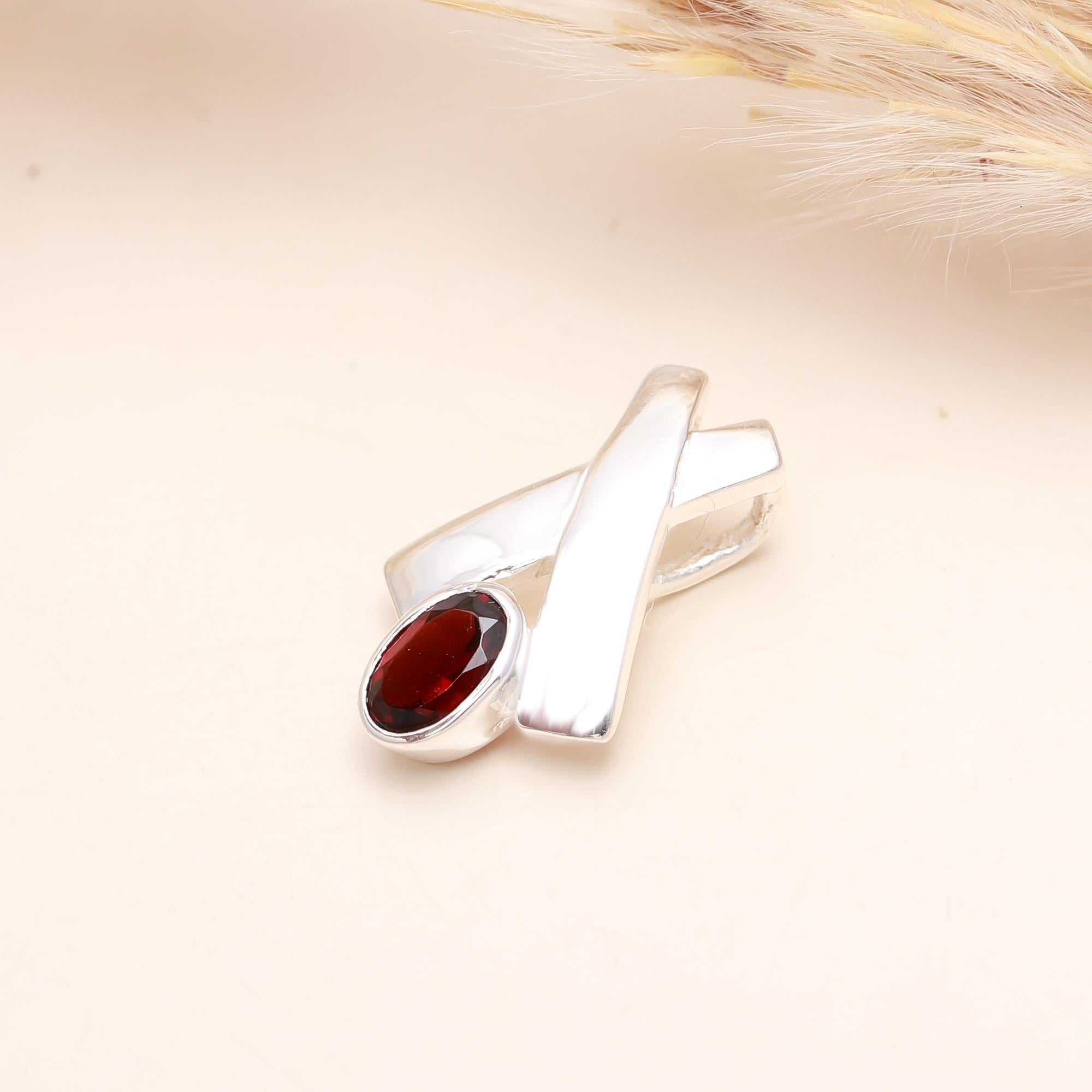 The Crimson Ribbon: Abstract Garnet Wrap Charm