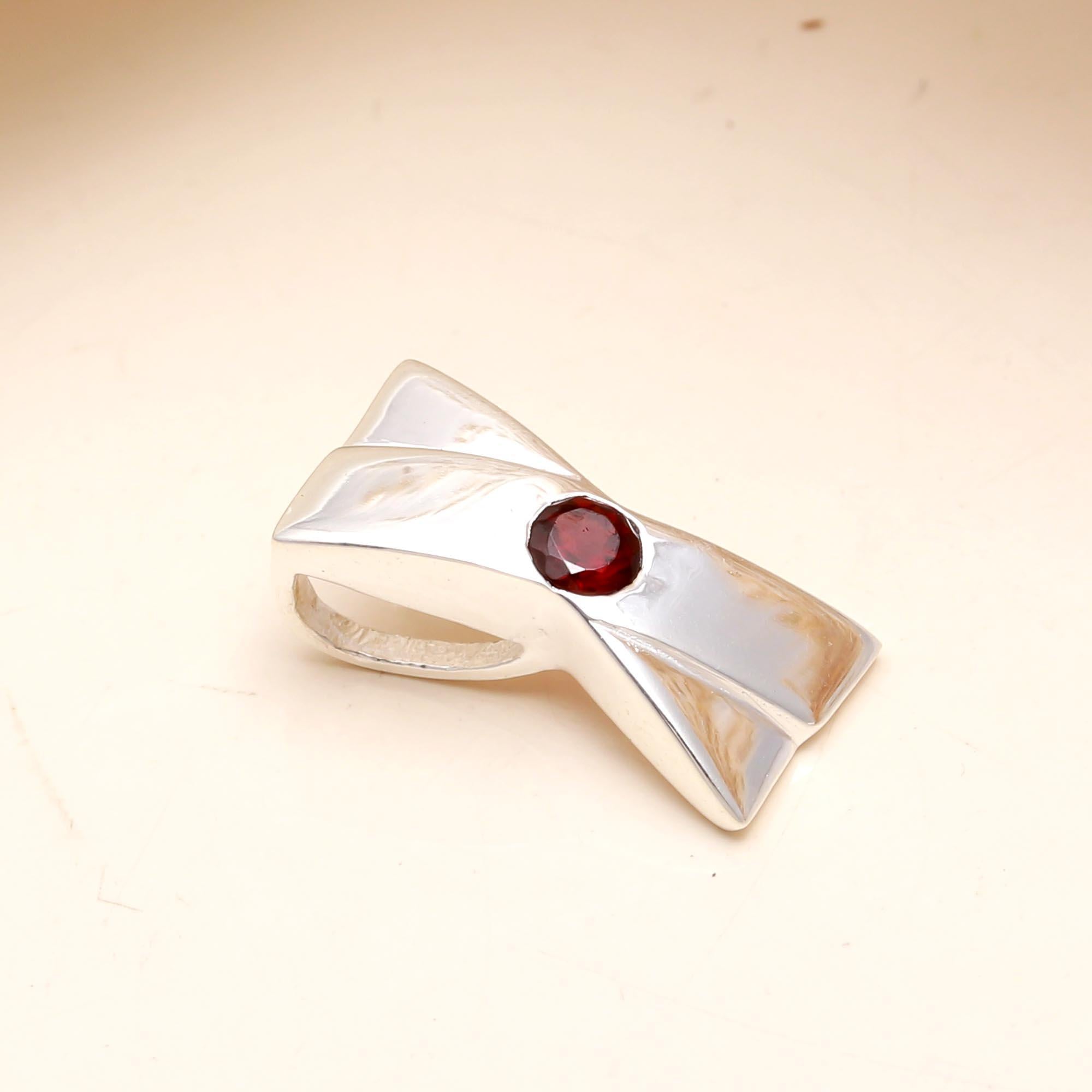 The Modern Bow: Sleek Silver Garnet Charm