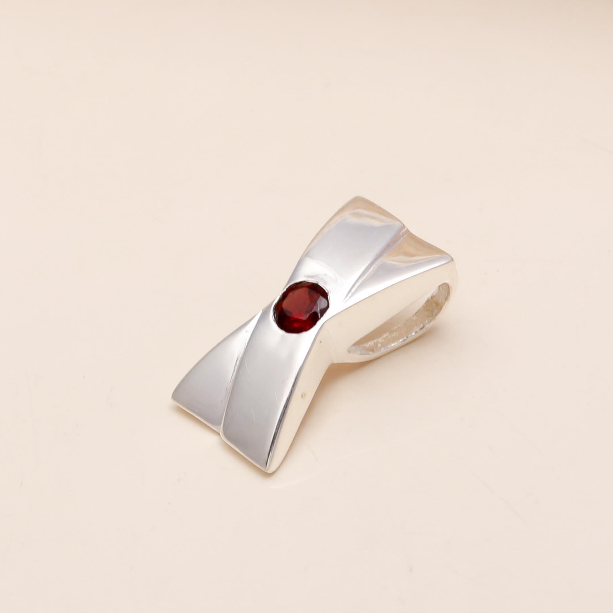 The Modern Bow: Sleek Silver Garnet Charm