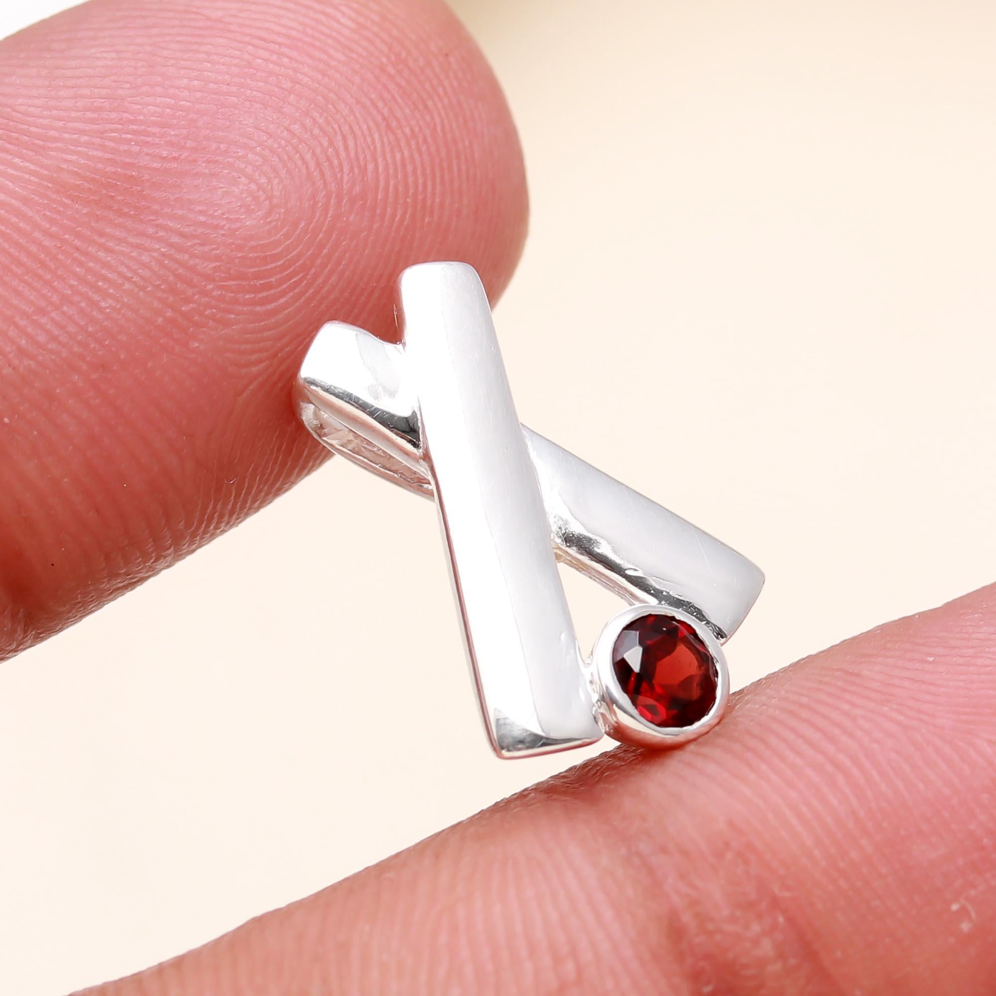The Geometric Cross: Garnet X-Shape Slide Charm