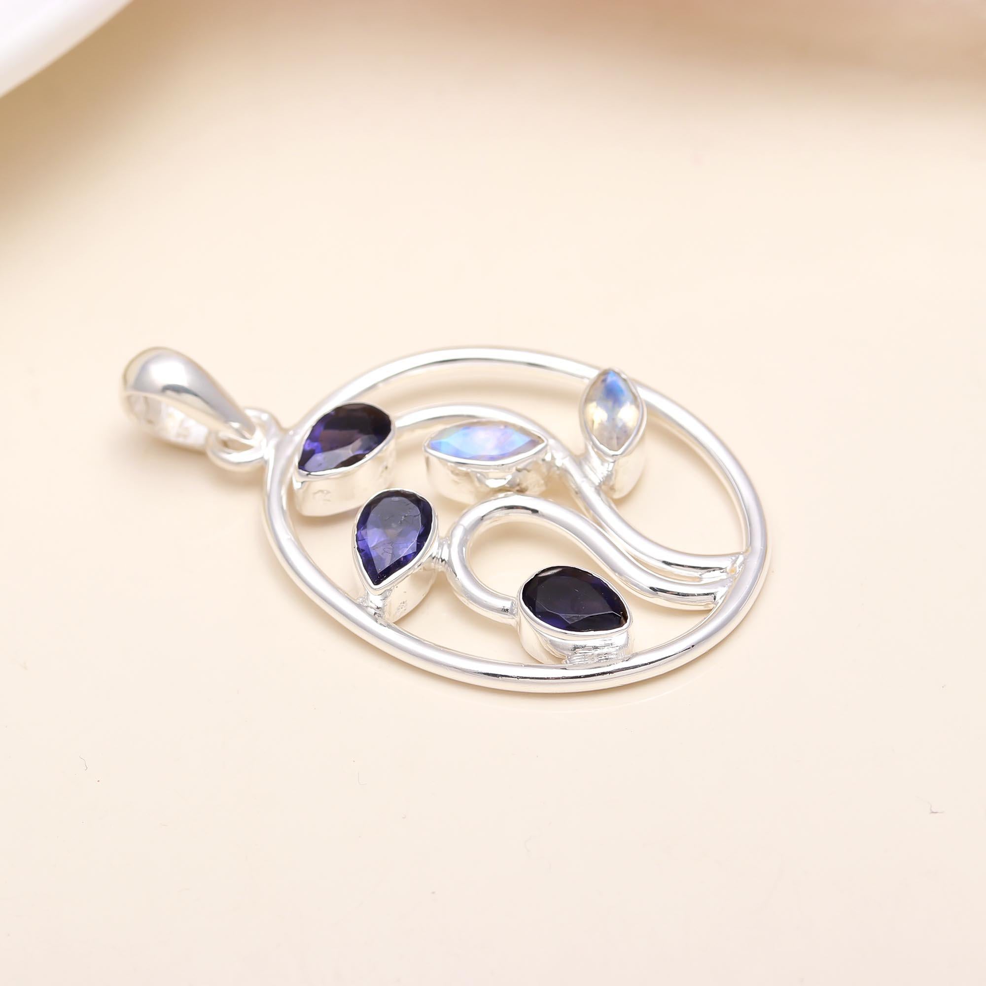 Silver Pendant Studded With Faceted Iolite