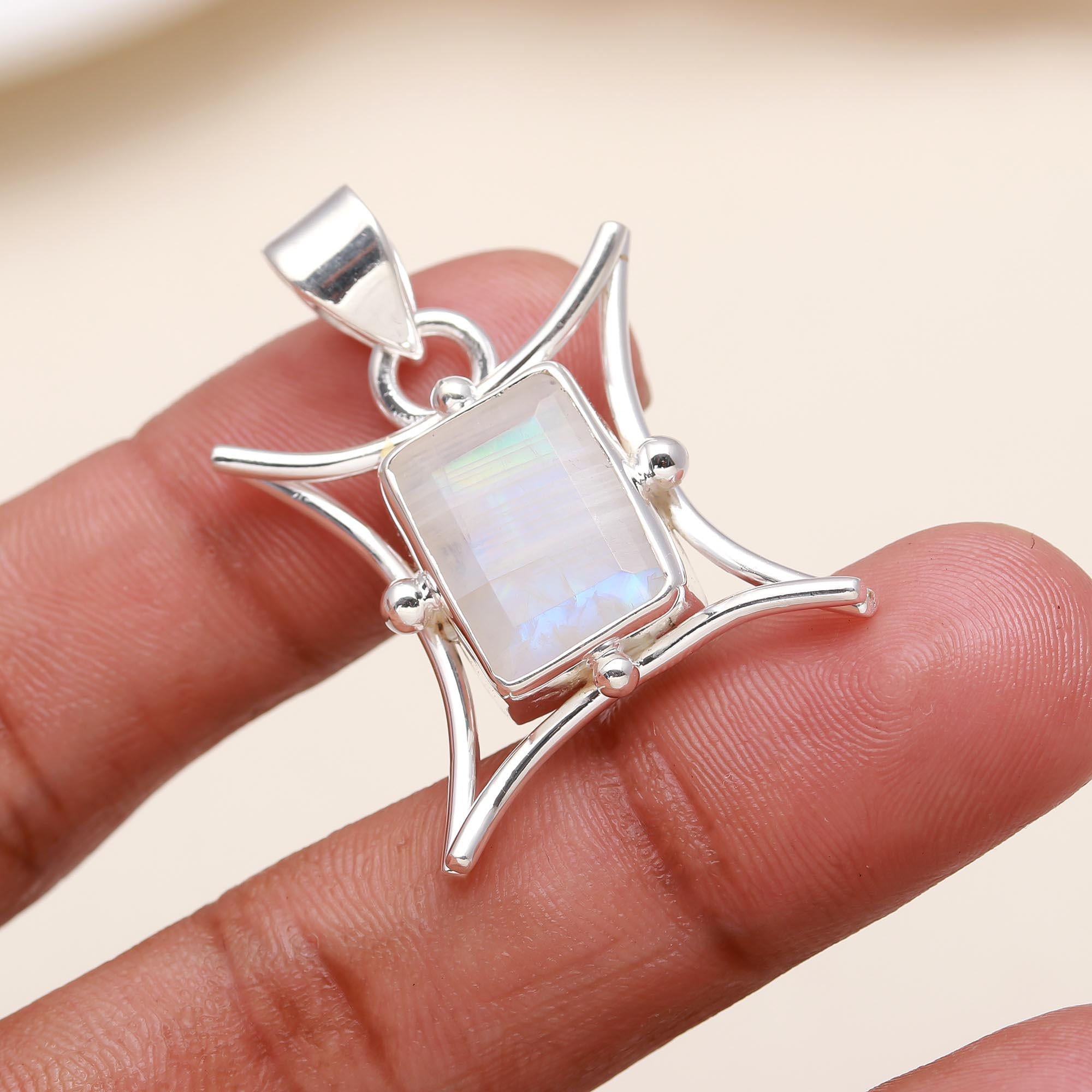 The Star Gate: Rainbow Moonstone Wing Silver Pendant