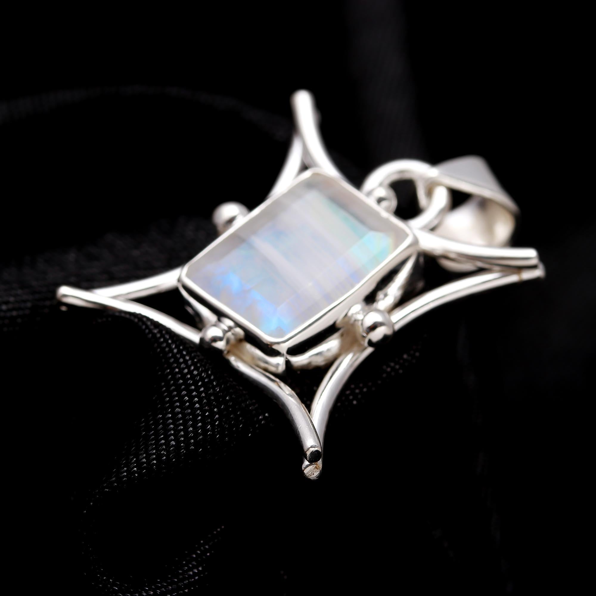 The Star Gate: Rainbow Moonstone Wing Silver Pendant