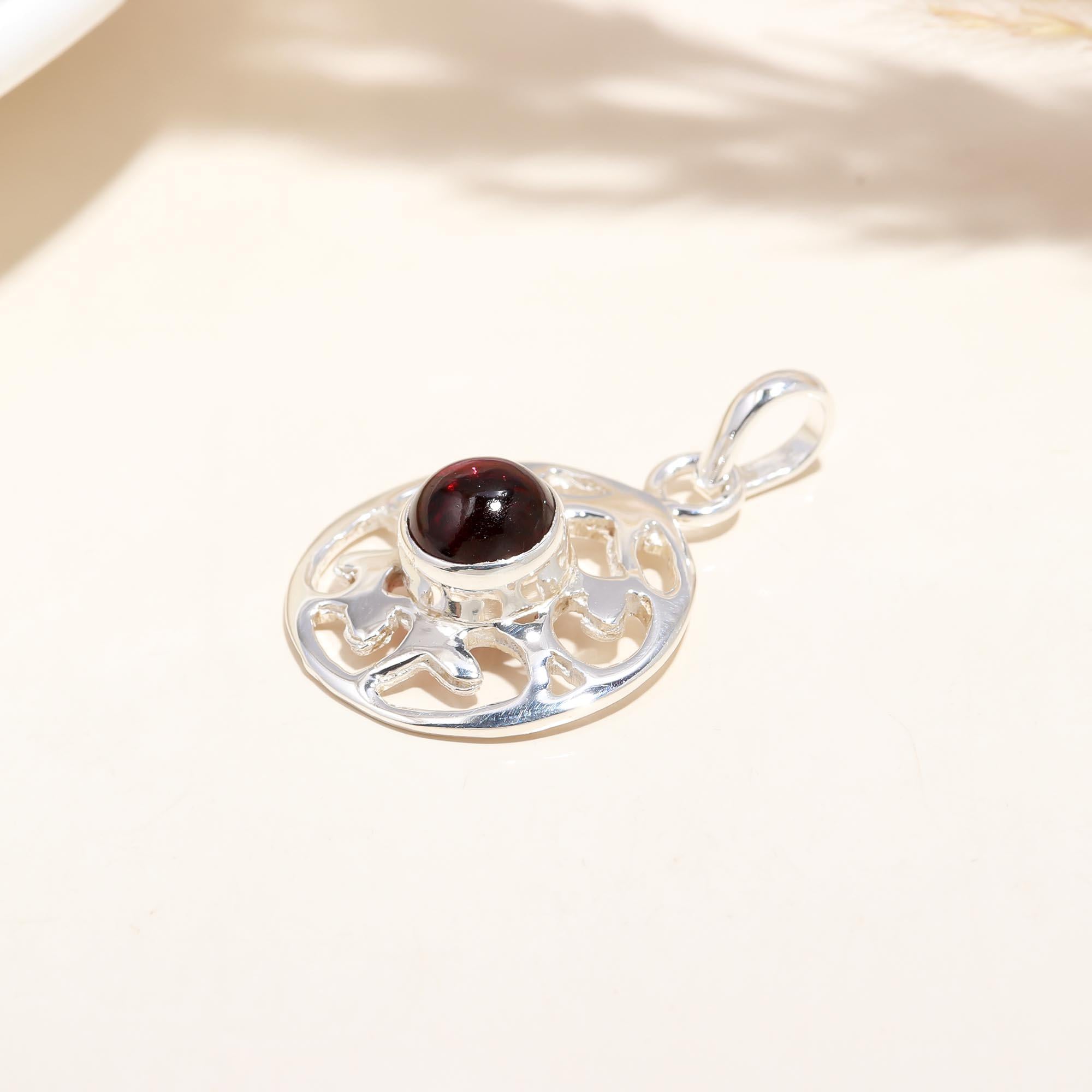 The Garnet Wheel: Garnet Cutout Circle Silver Pendant