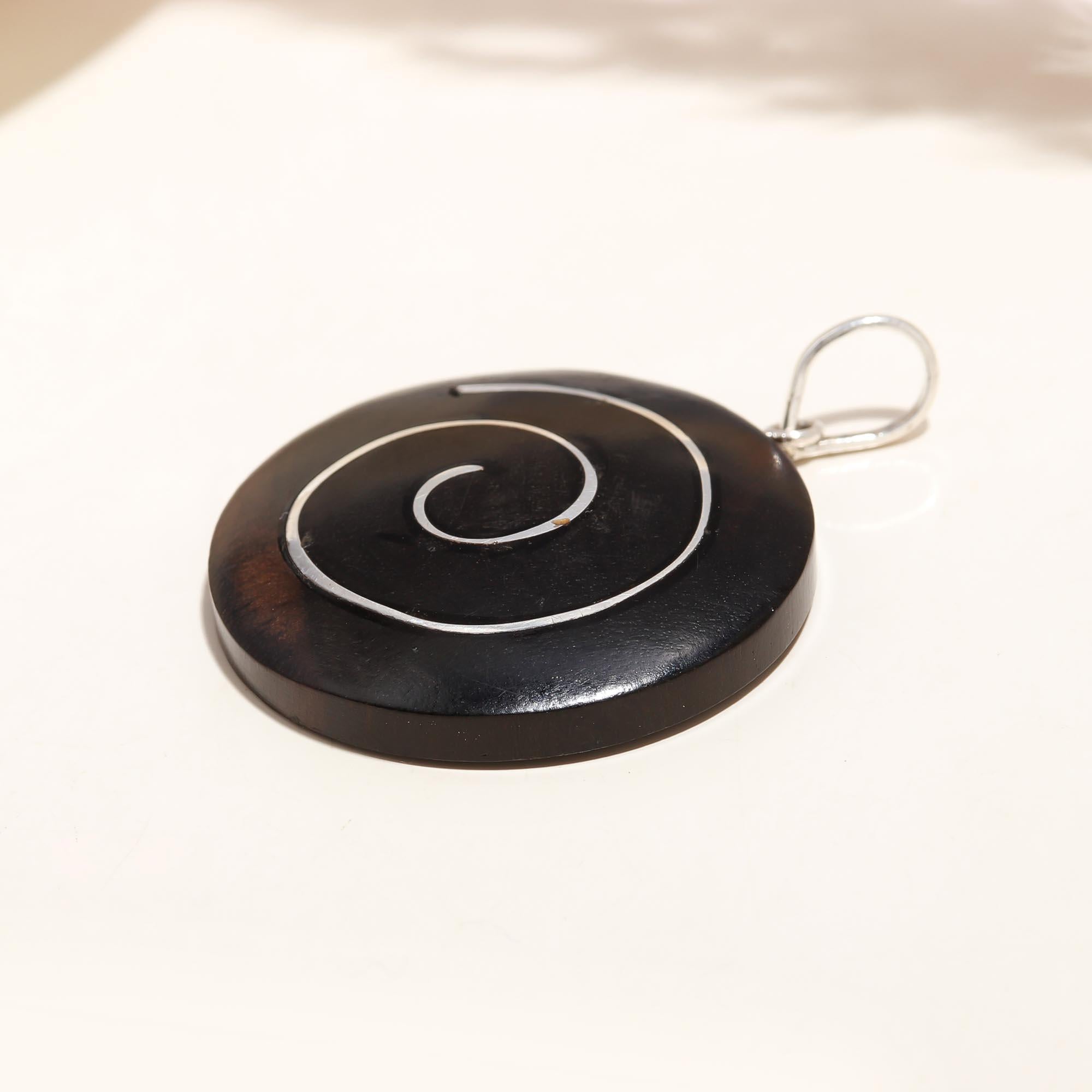 The Dark Spiral: Black Wood Silver Inlay Spiral Disc Pendant