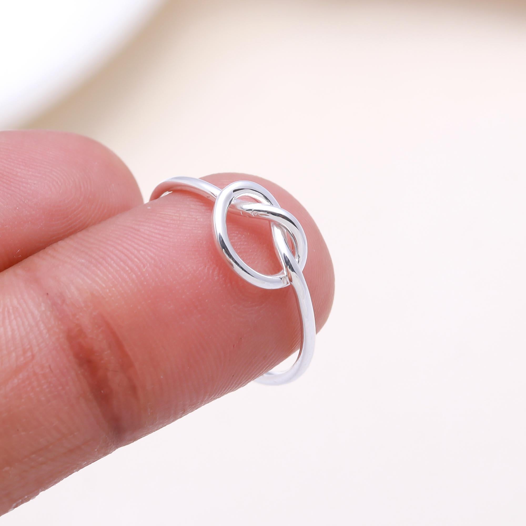 The Endless Bond: Minimalist Silver Love Knot Ring