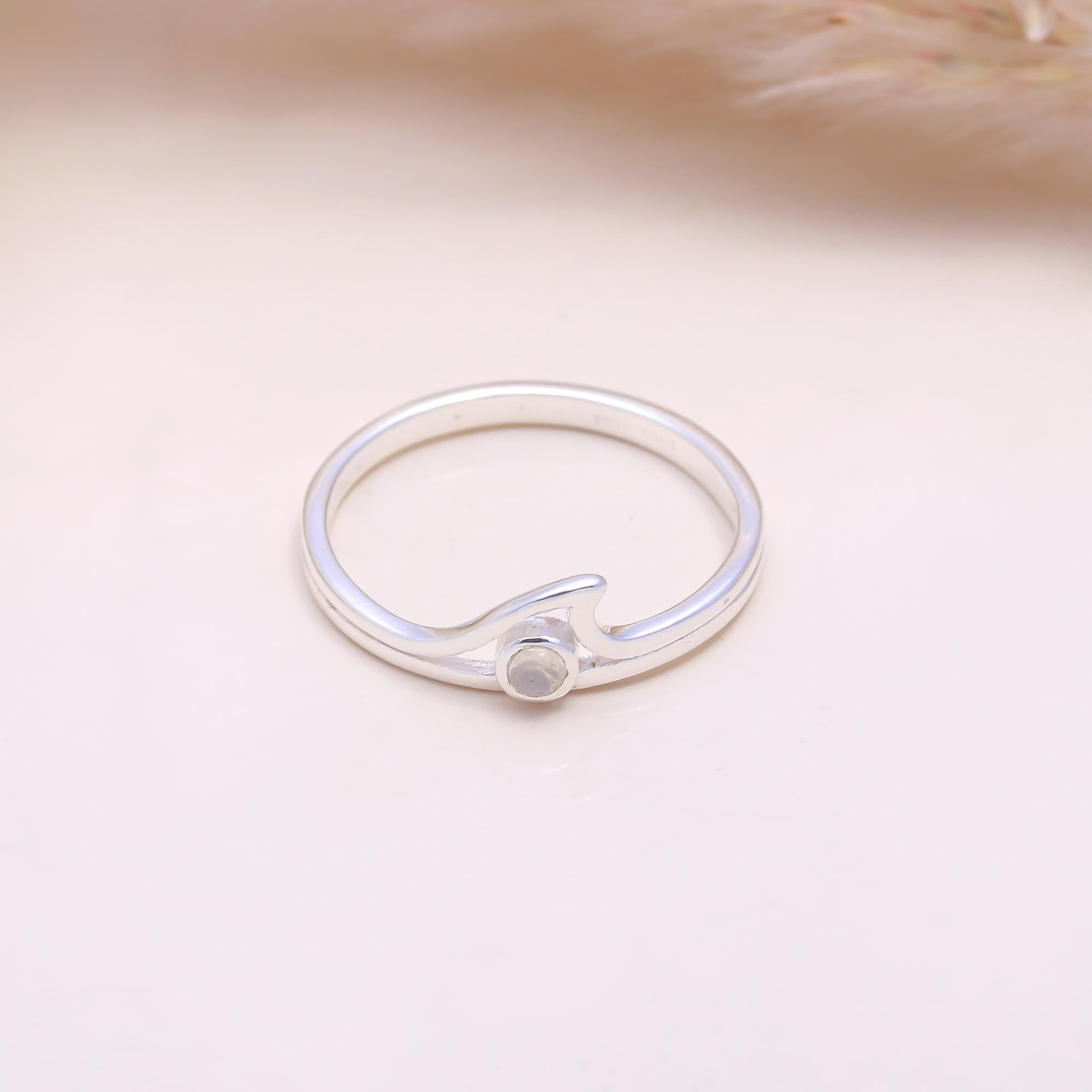 The Ocean Embrace: Moonstone Wave Ring