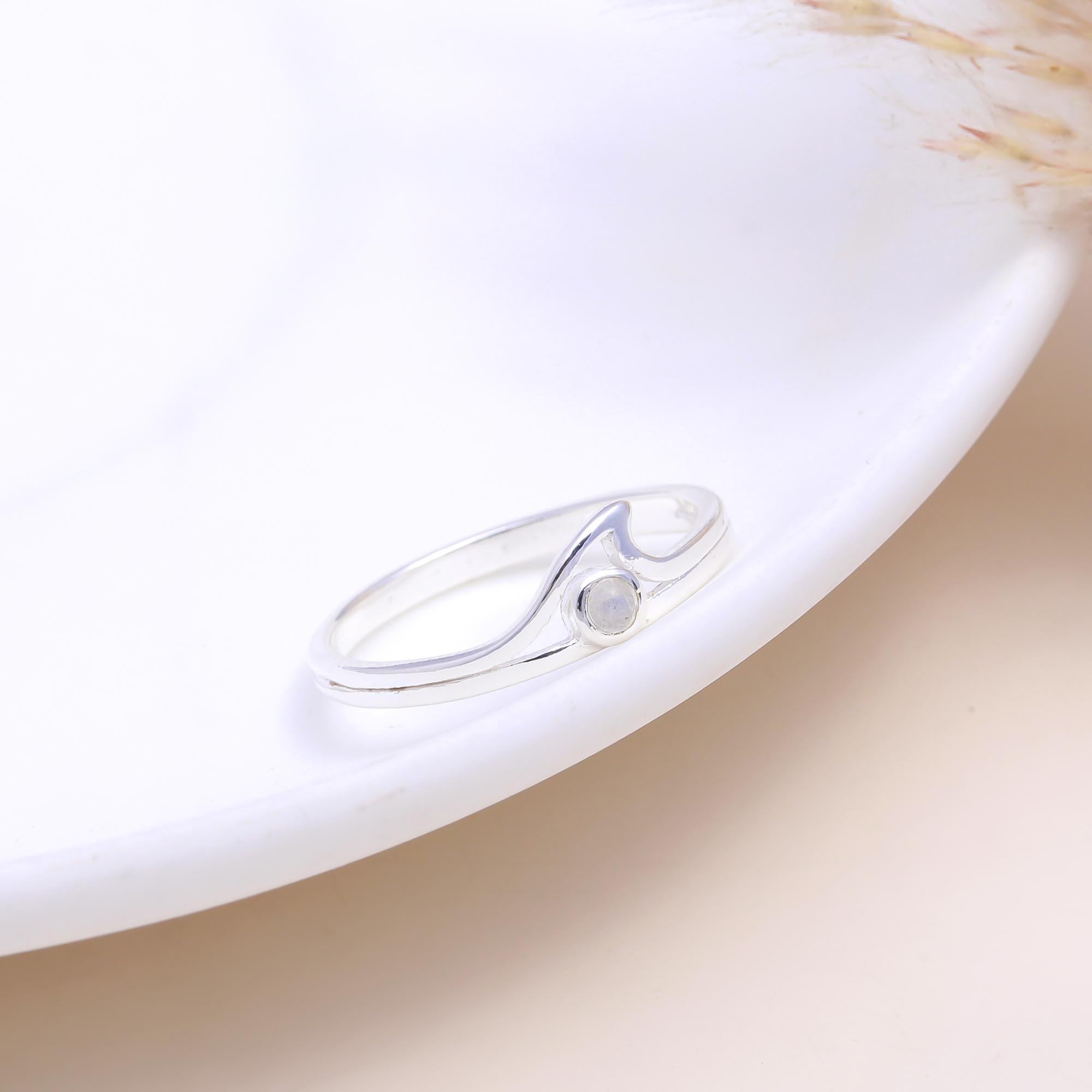 The Ocean Embrace: Moonstone Wave Ring