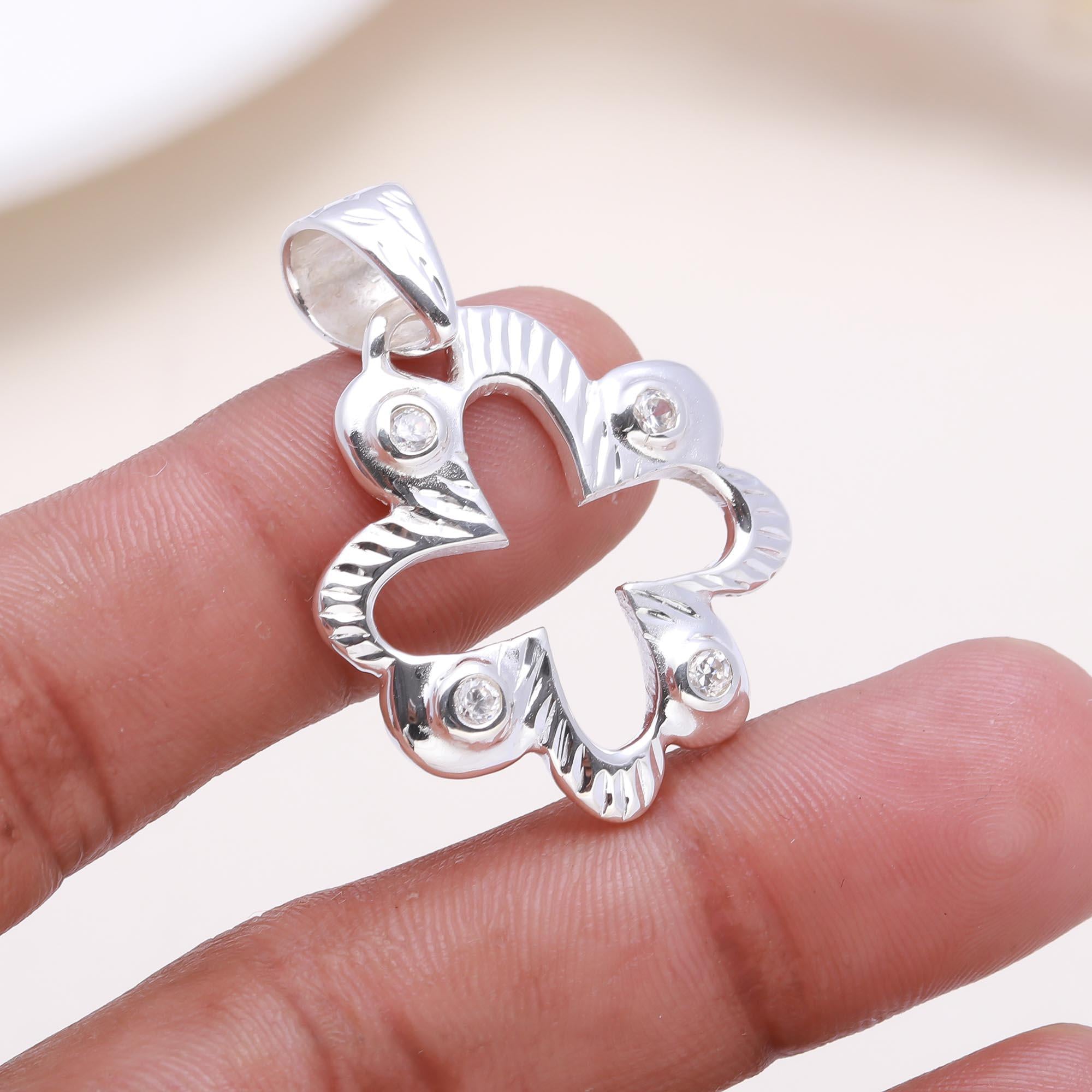 The Lucky Sparkle: Cubic zirconia Cutout Flower Pendant