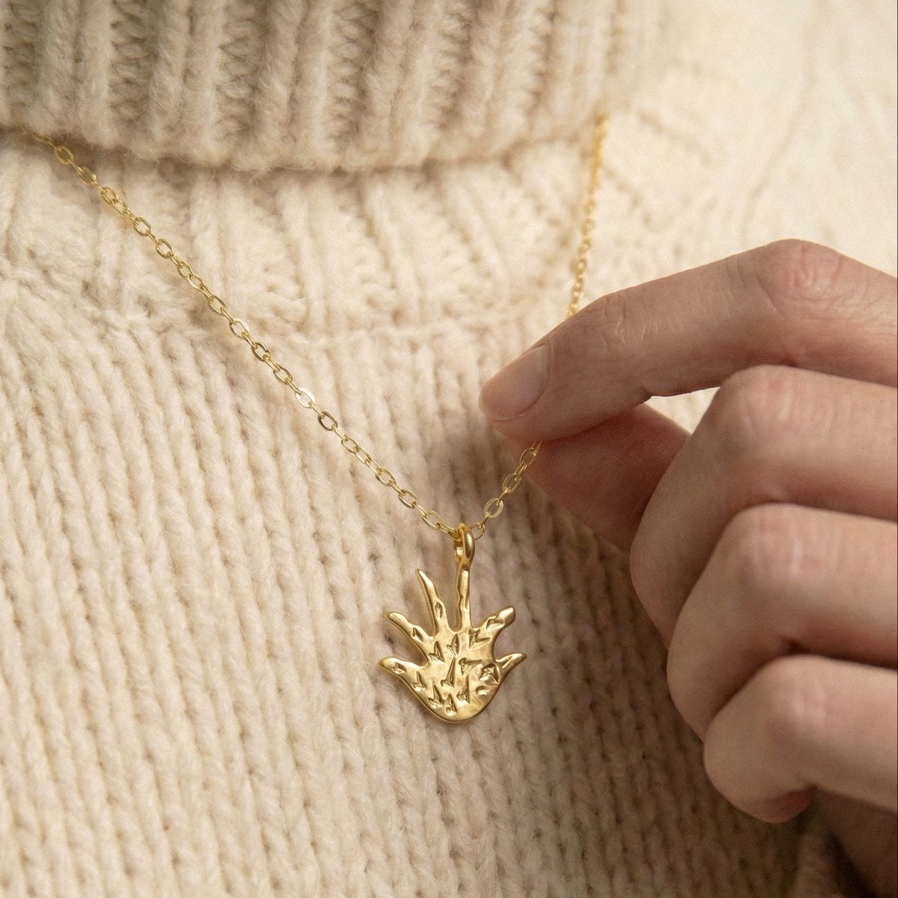 The Golden Palm: Abstract Textured Hand Necklace