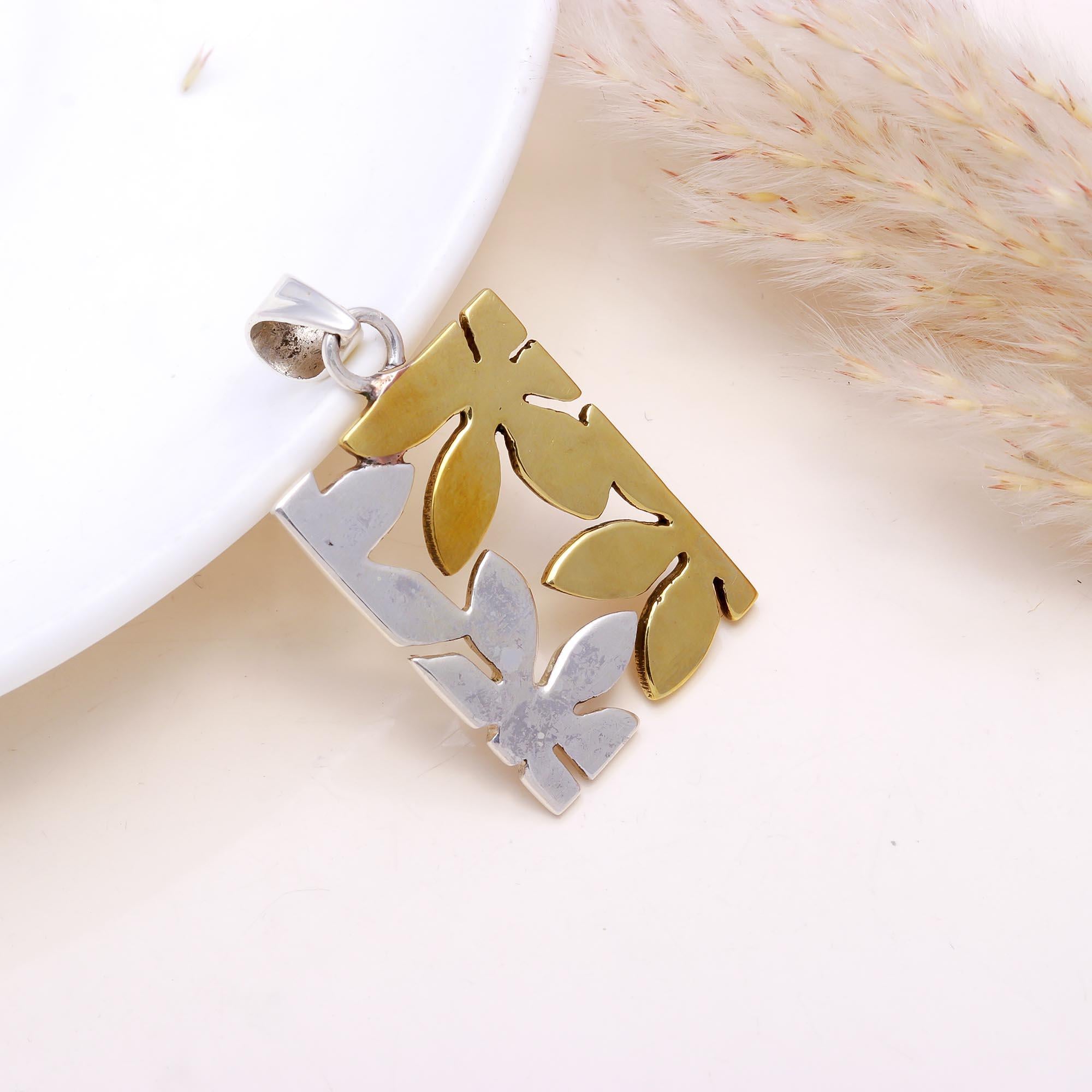 The Botanical Puzzle: Two-Tone Geometric Leaf Pendant