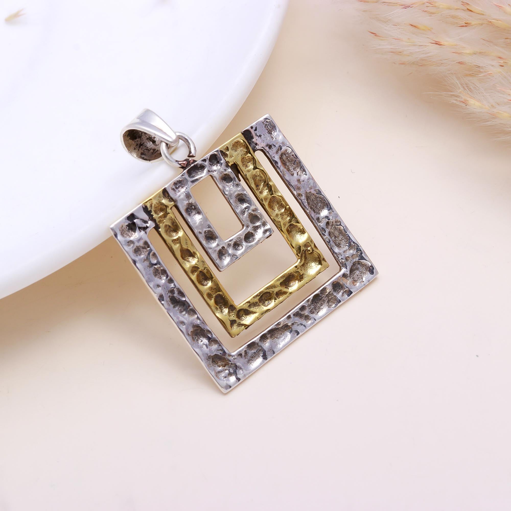 The Rustic Geo-Frame: Hammered Two-Tone Nested Pendant