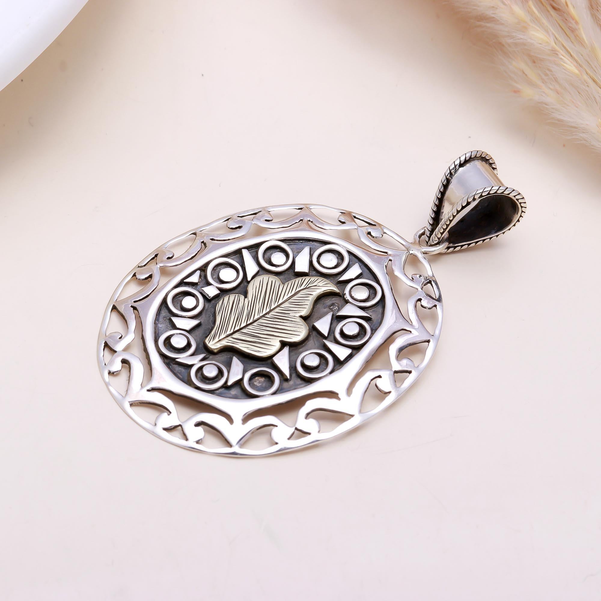 The Autumn Heritage: Two-Tone Leaf Oval Pendant