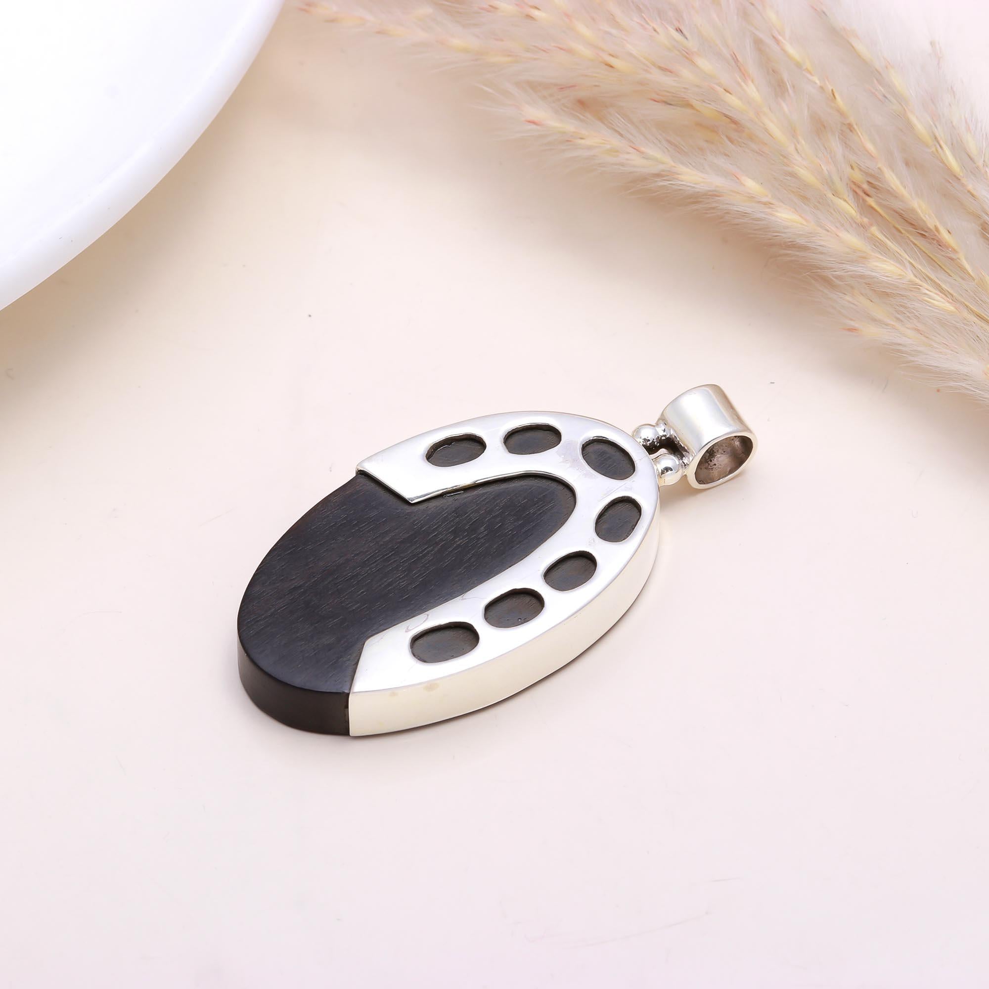 The Ebony Oval: Silver & Black Wood Oval Pendant