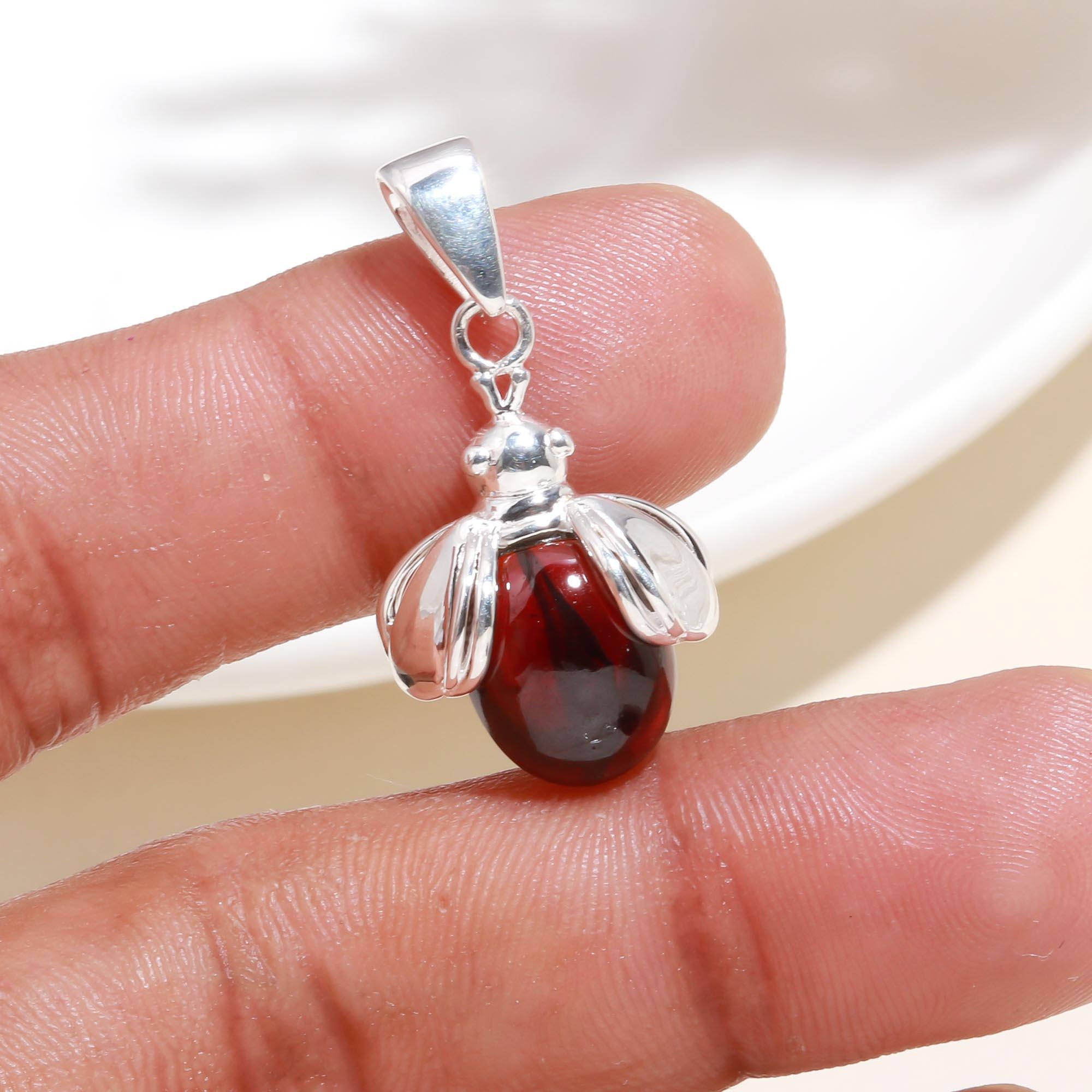 The Crimson Bee: Garnet Insect Motif Silver Pendant