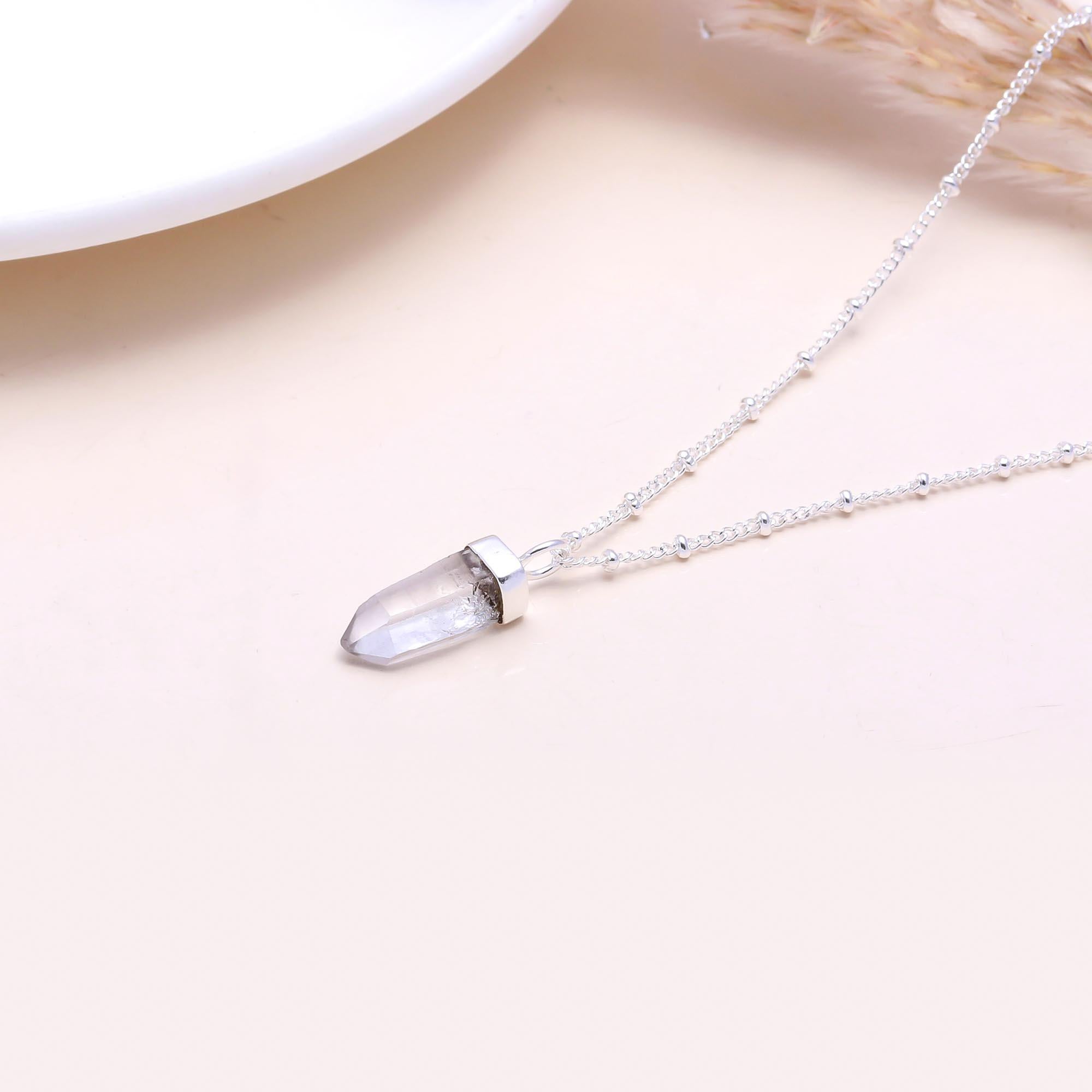 The Clear Quartz Point: Natural Crystal Hexagon Pendant