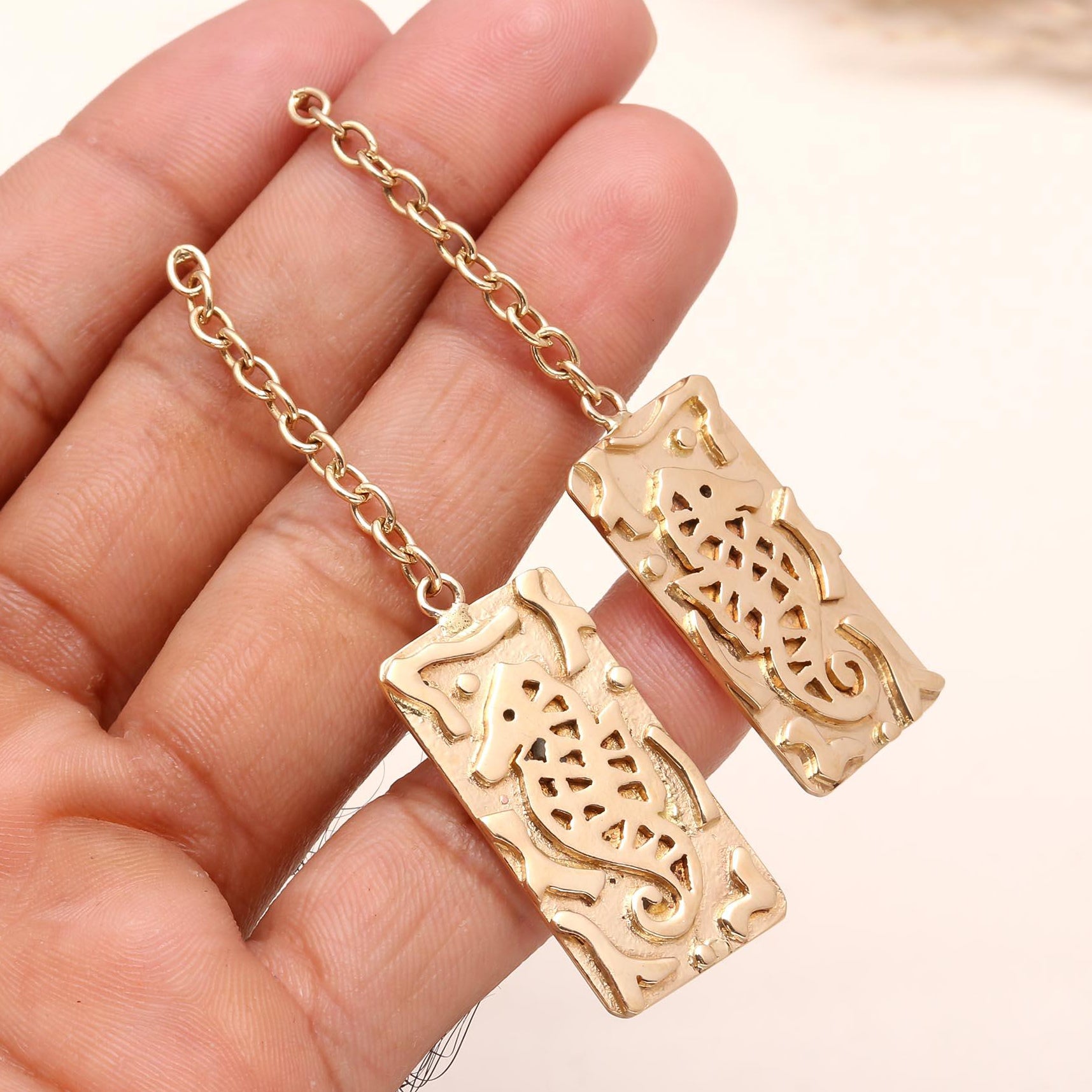 The Golden Seahorse: Intricate Cutout Drop Earrings