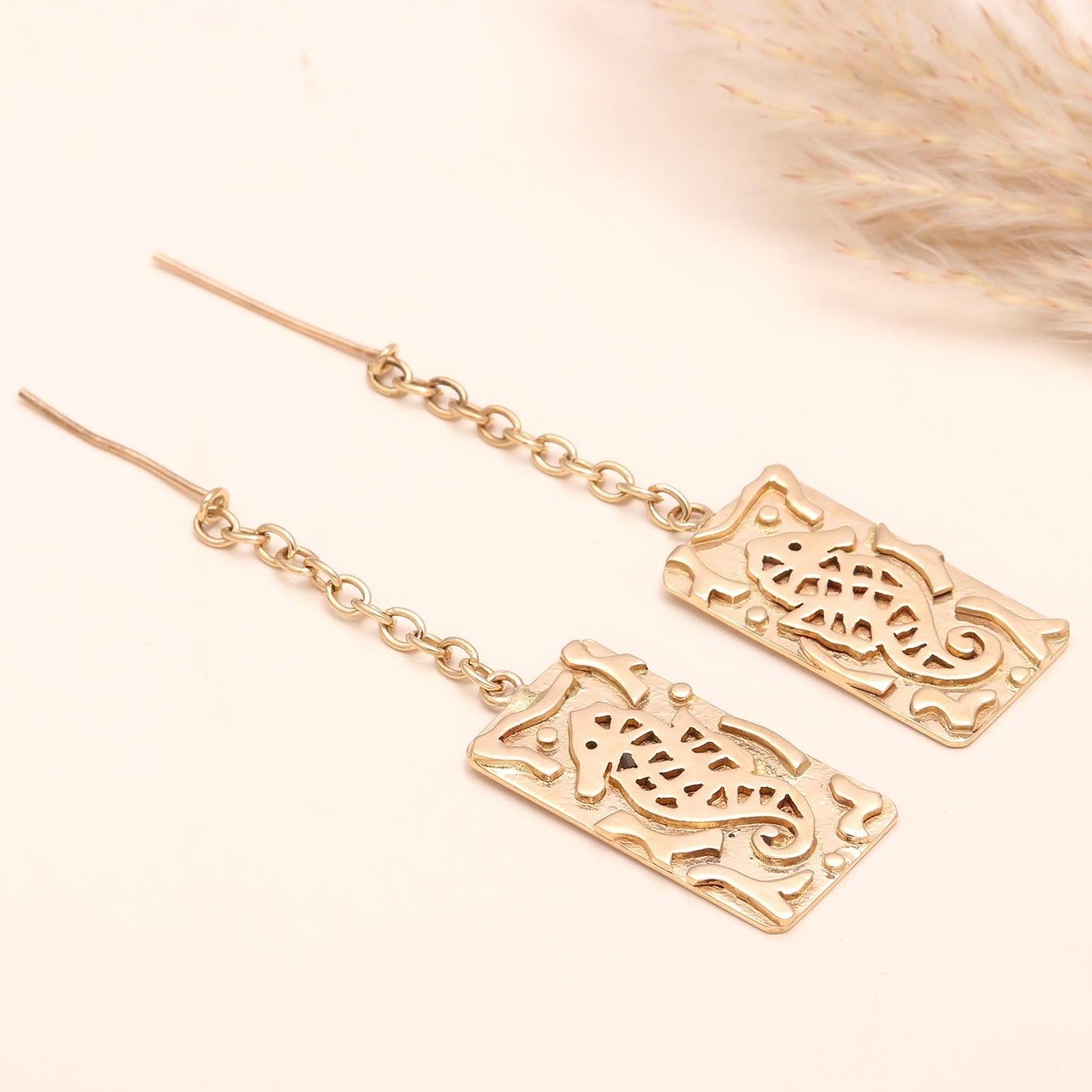 The Golden Seahorse: Intricate Cutout Drop Earrings