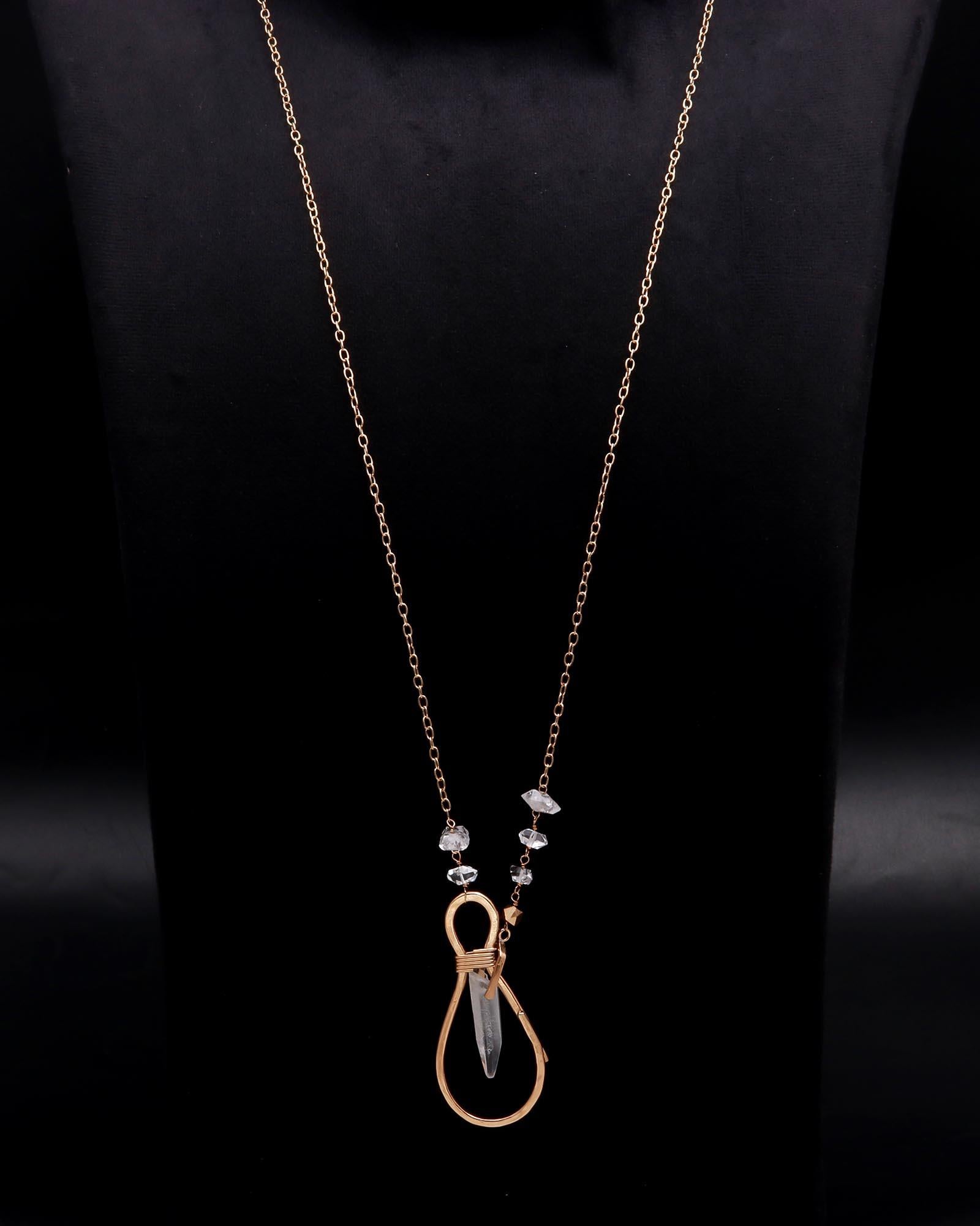 The Crystal Loop: Gold Wire Wrapped Raw Quartz Pendant