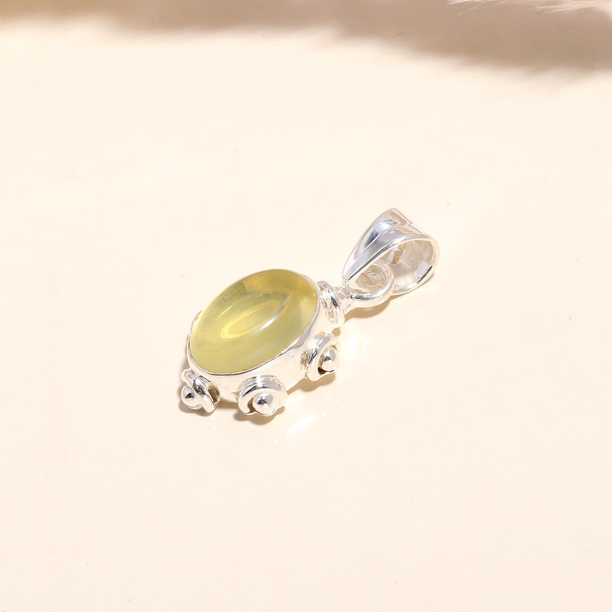 The Solar Pebble: Minimalist Studded Oval Charm