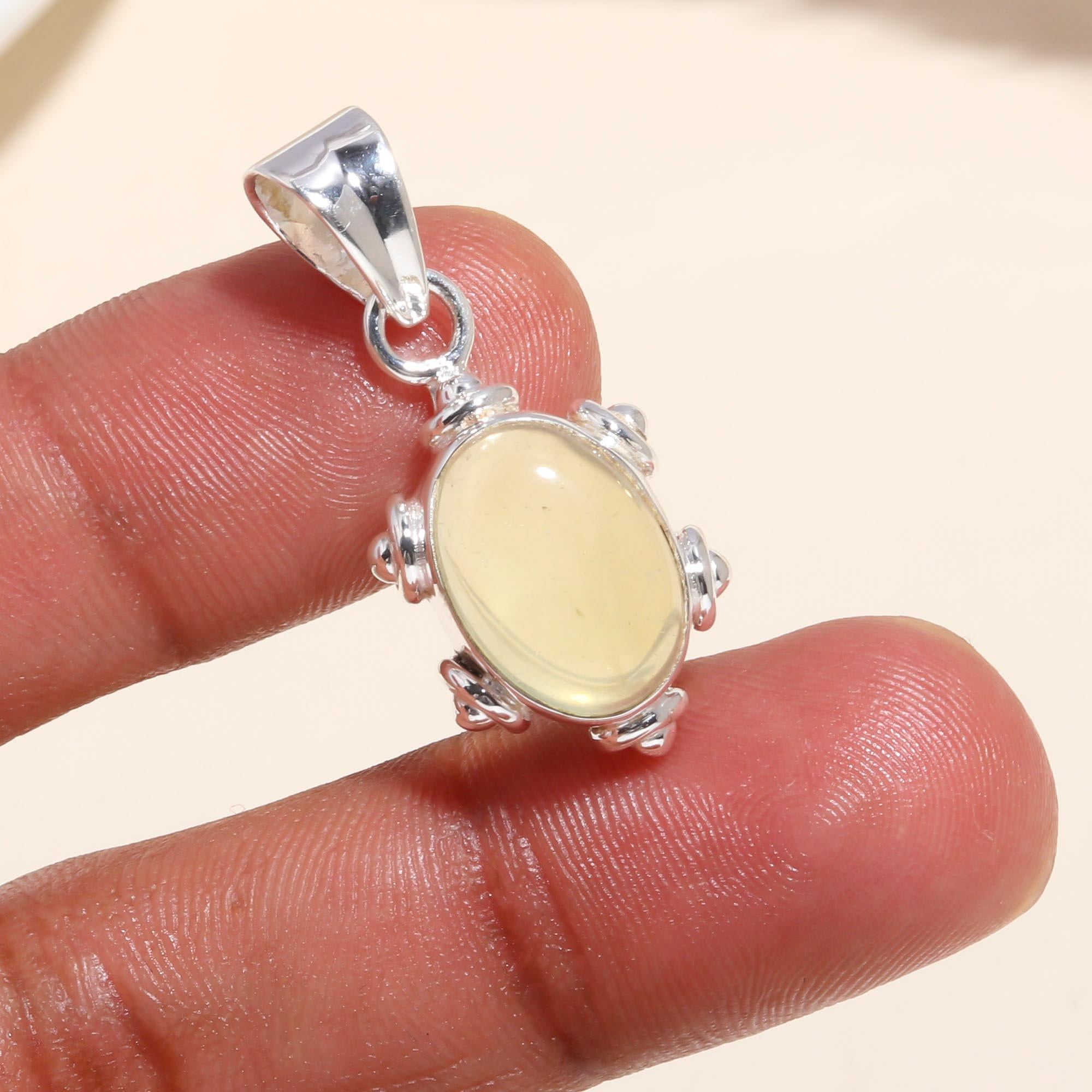 The Solar Pebble: Minimalist Studded Oval Charm