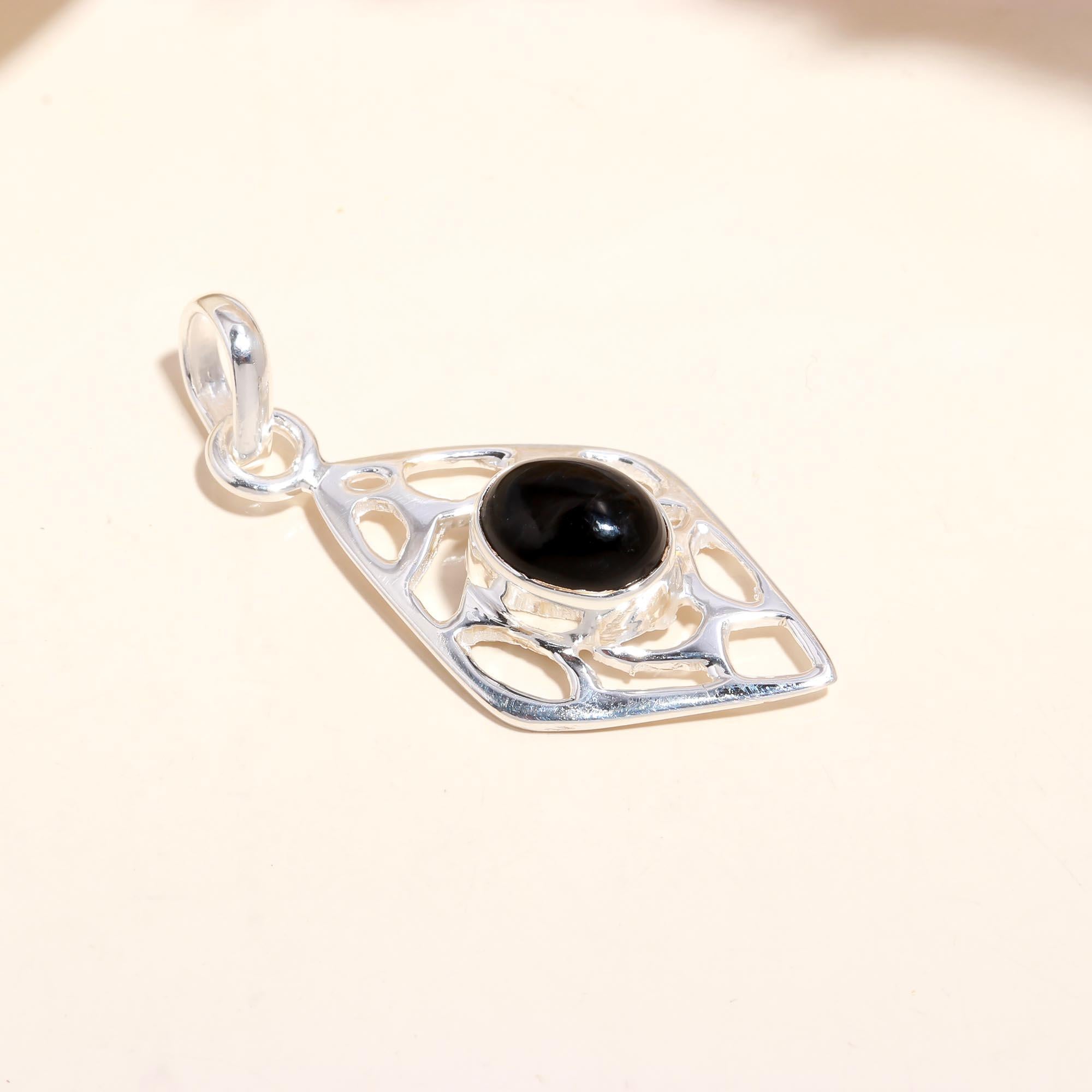 The Diamond Window: Black Onyx Filigree Pendant