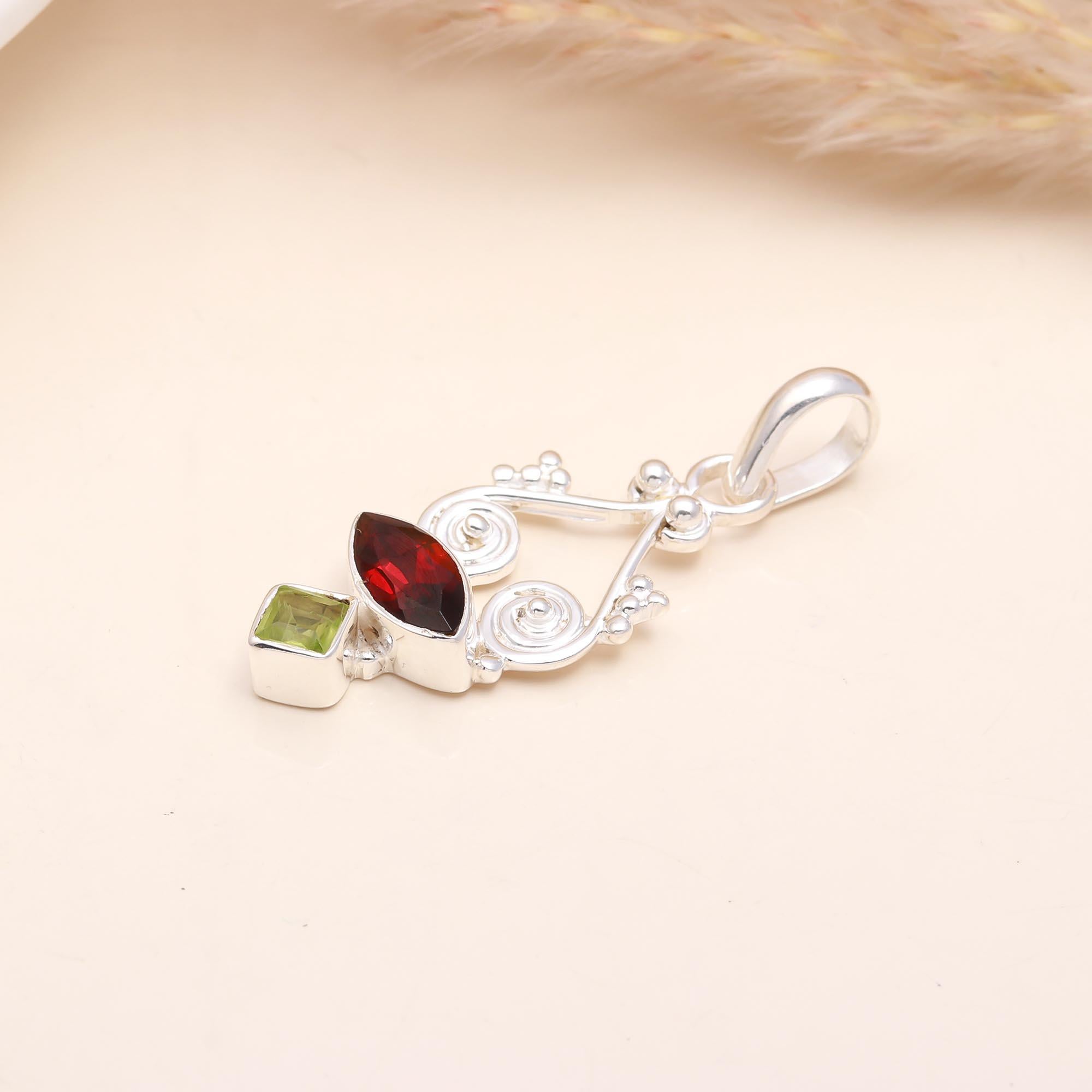 The Garnet Helix: Abstract Garnet & Peridot Silver Pendant