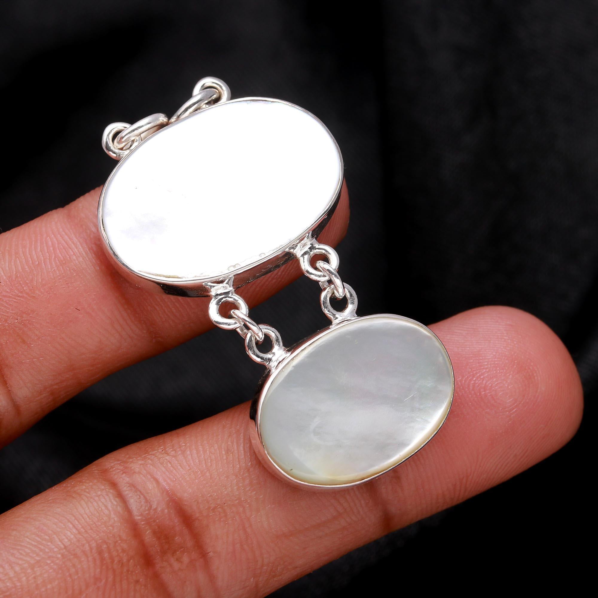 The Pearl Tier: Articulated Mother of Pearl Silver Pendant