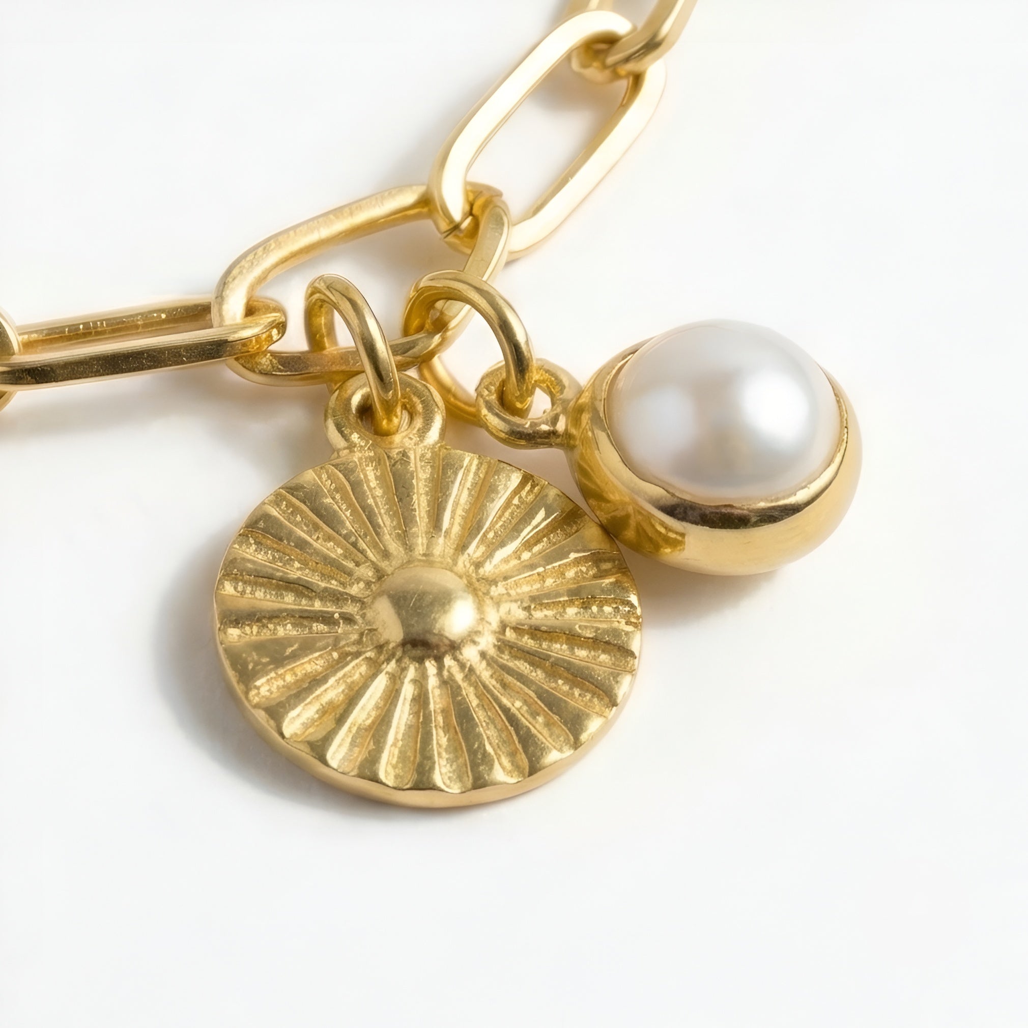 The Soleil Sacré: Sun Medallion & Pearl Charm Bracelet