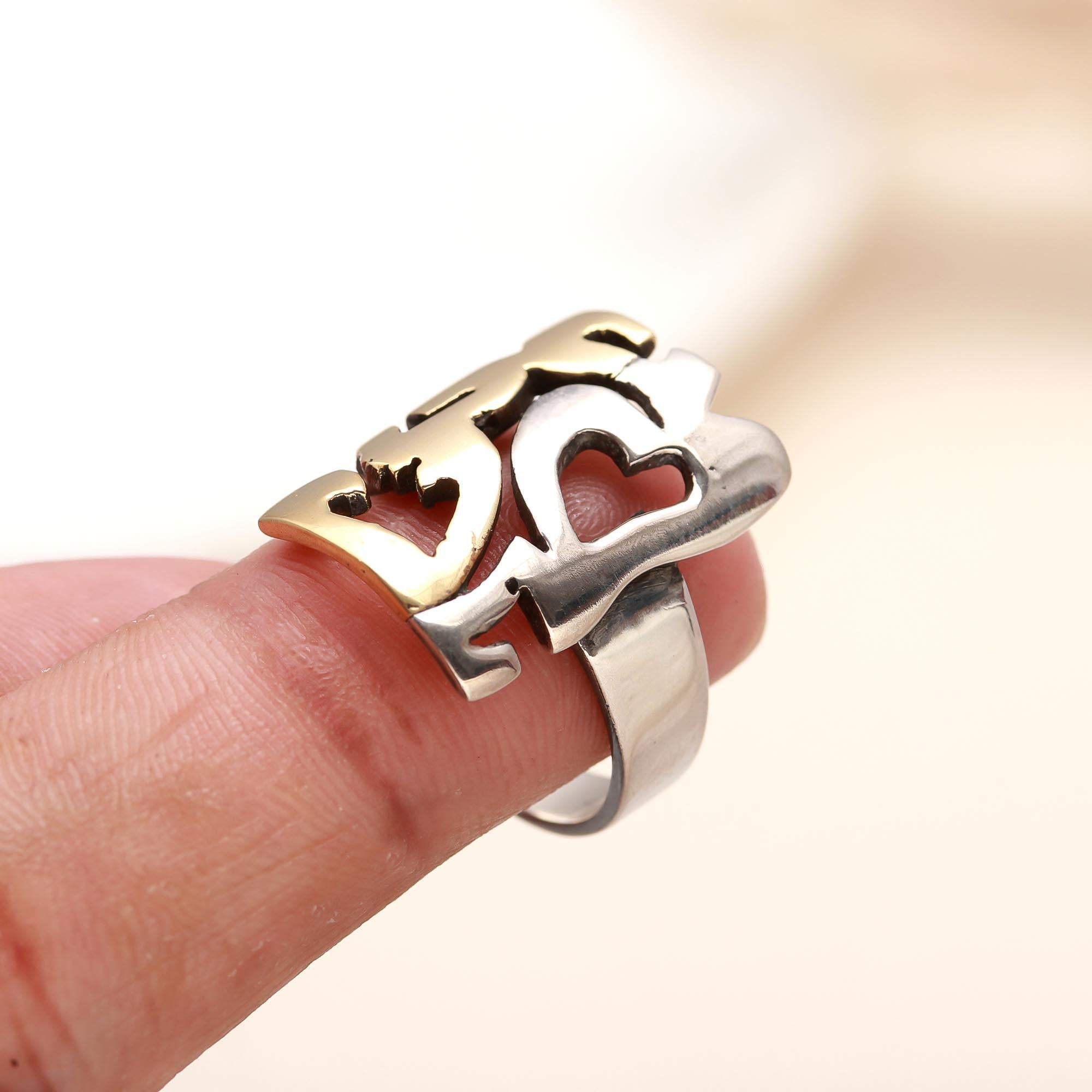 Sterling silver love cutout ring with gold accents