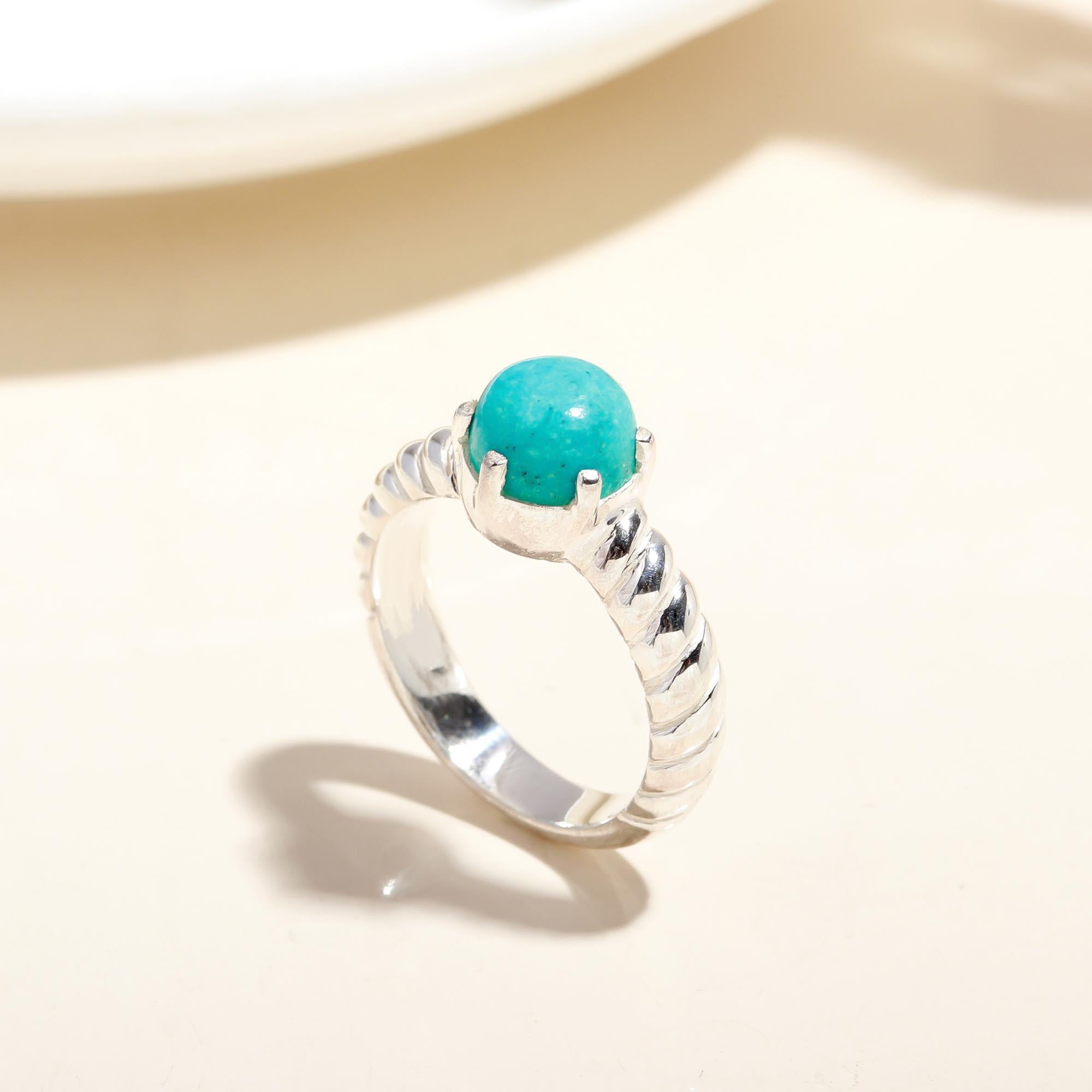 Handmade sterling silver twisted band turquoise ring