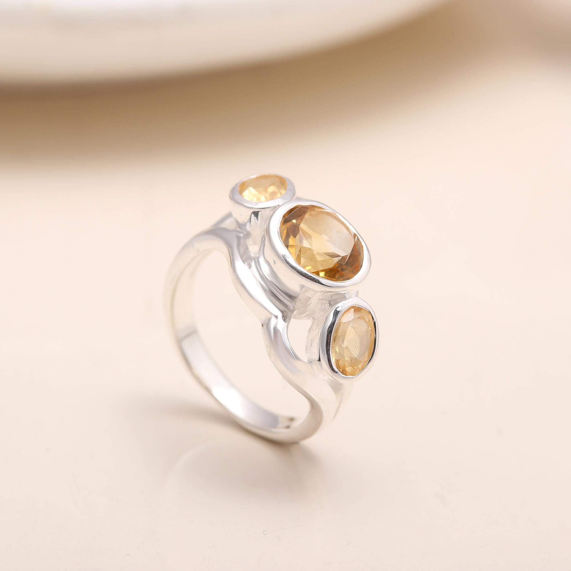 Handmade sterling silver band with three citrine stones
