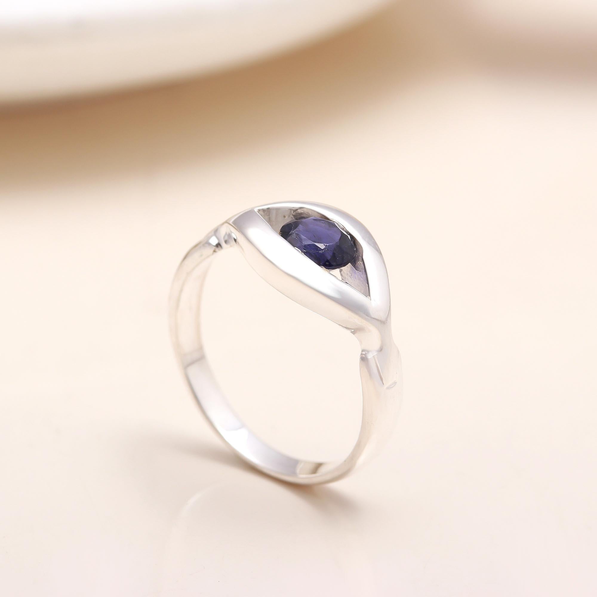 Handmade iolite solitaire ring in silver