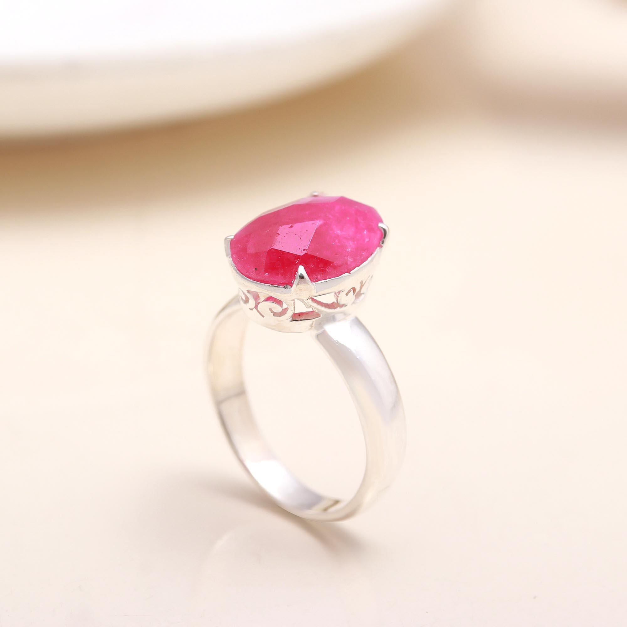 Faceted oval ruby gemstone ring in sterling silver