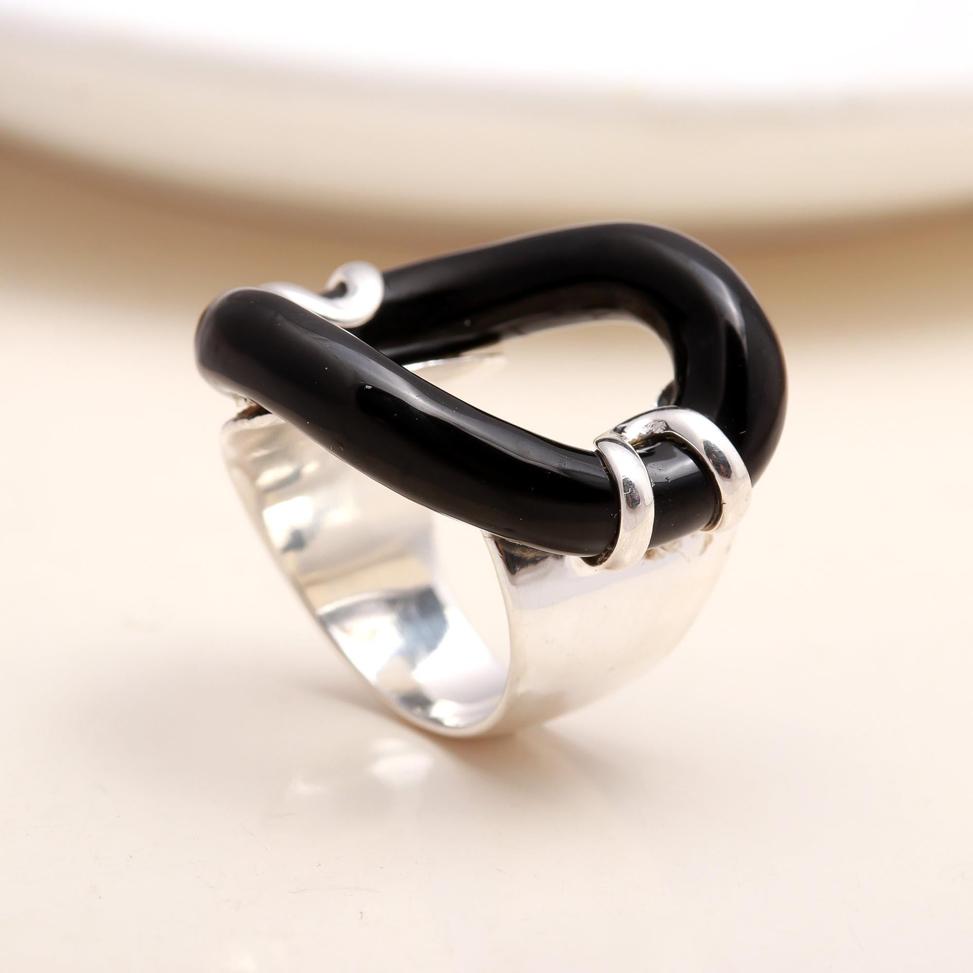 Close-up of black enamel detail on sterling silver ring