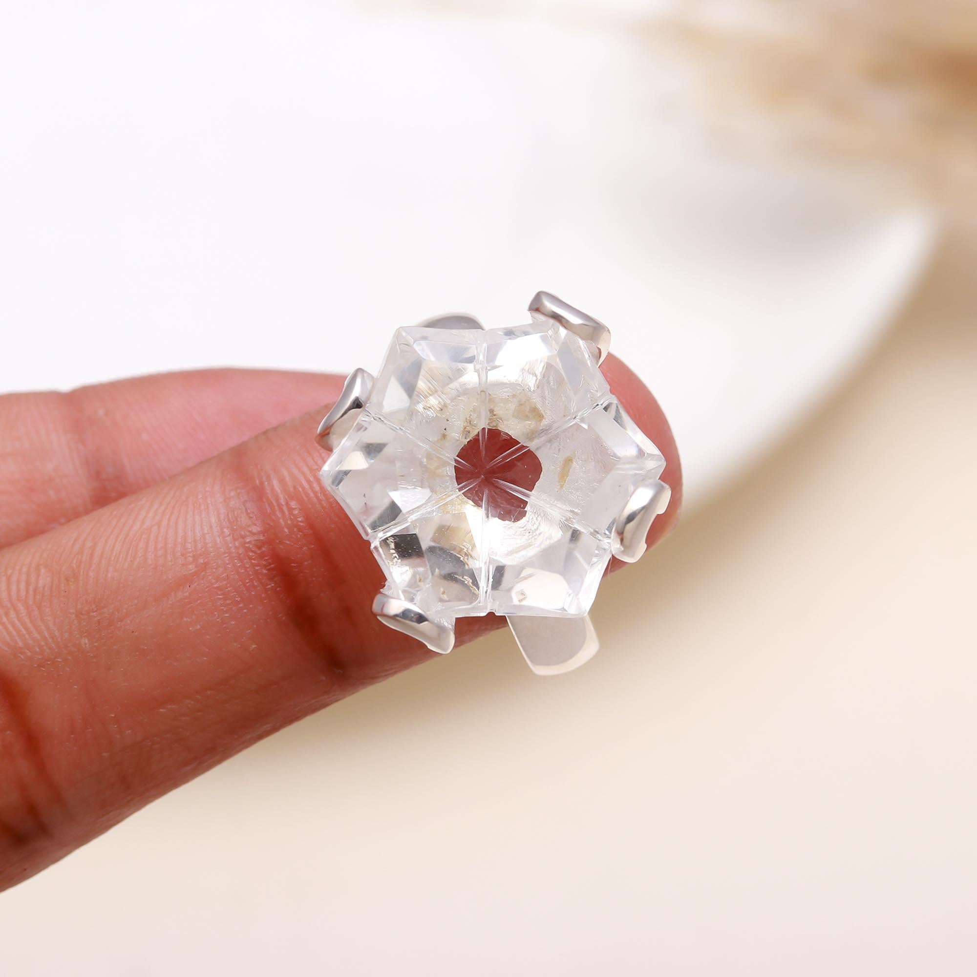Elegant hexagon clear quartz gemstone ring on finger