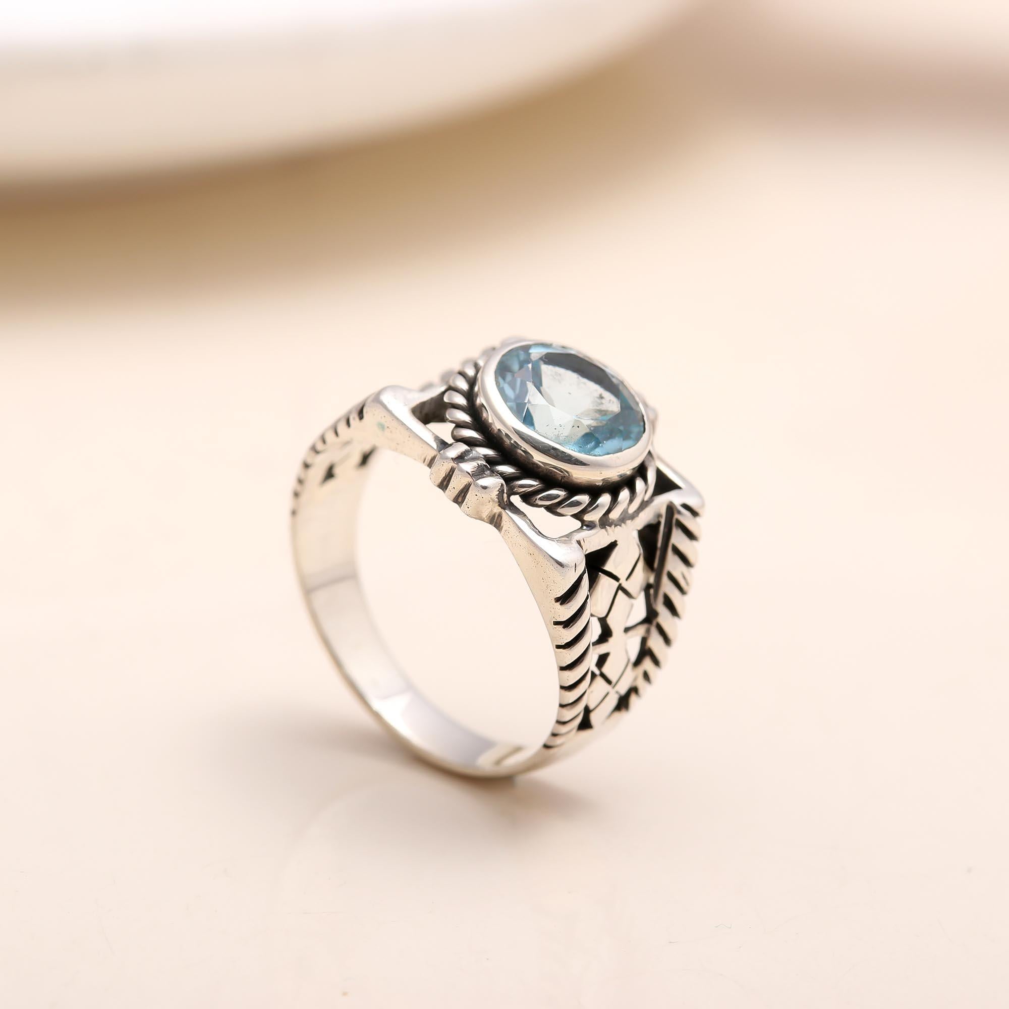 Handmade sterling silver blue topaz vintage style ring