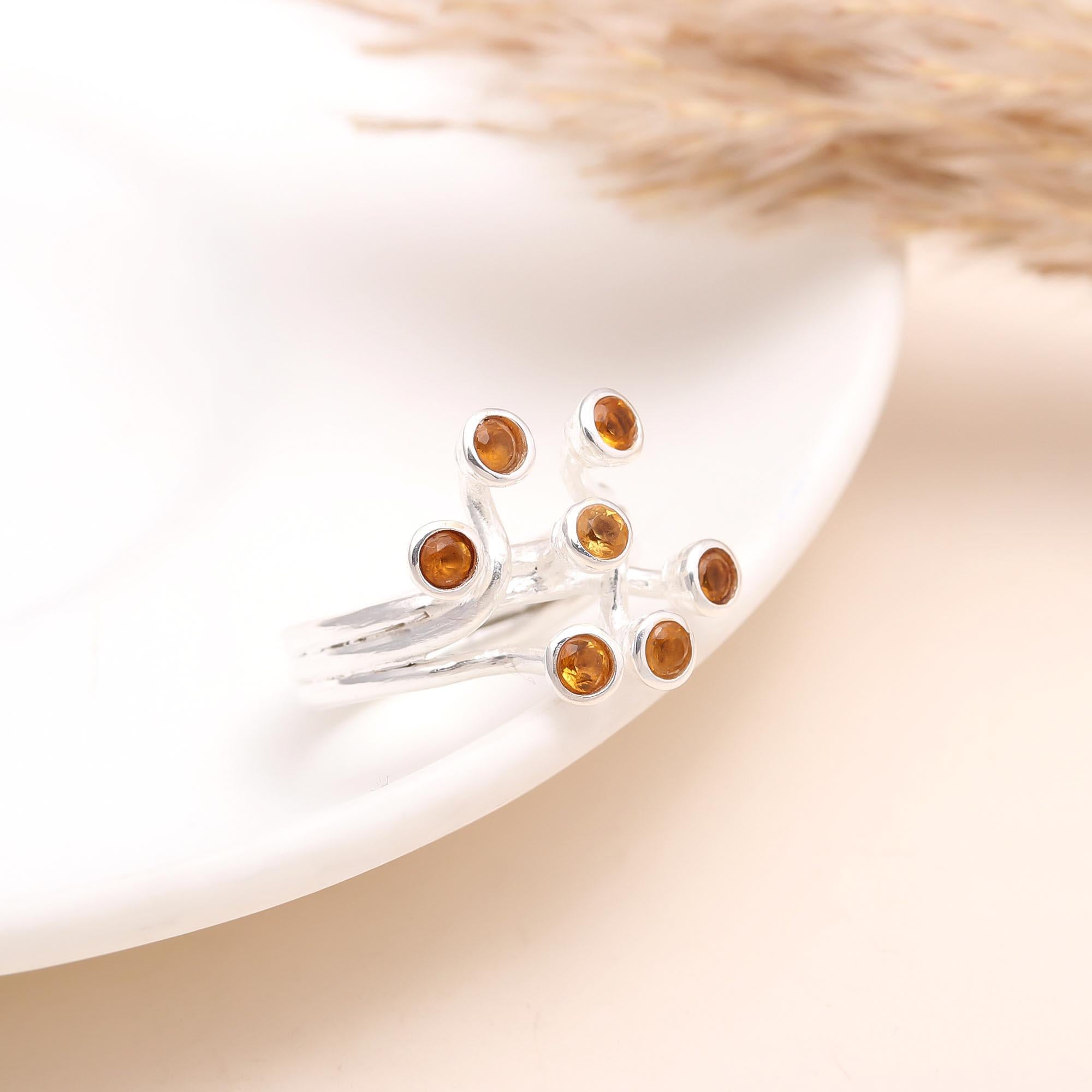 The Hessonite Spray: Multi-Level Bezel Ring