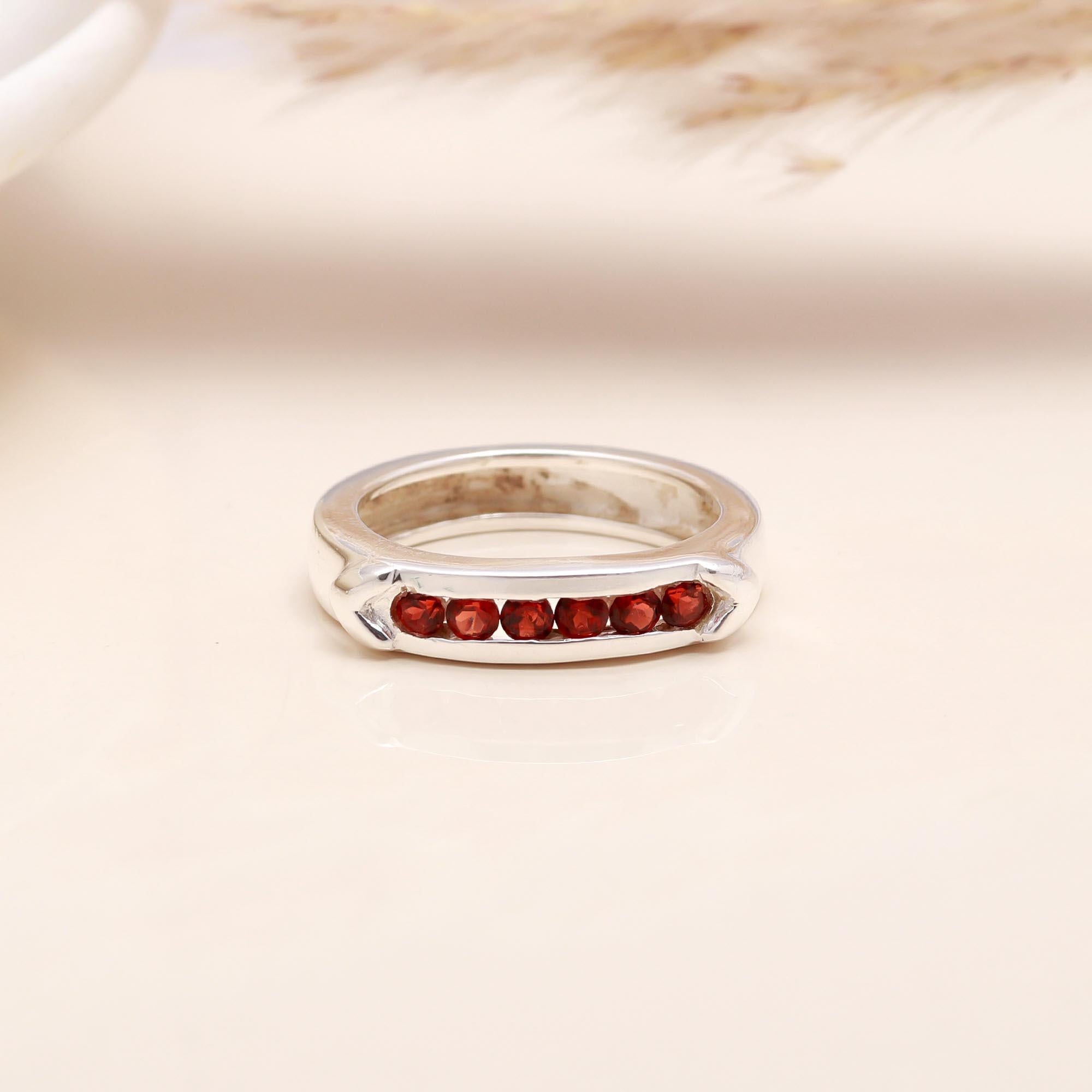 The Red Path: Channel Set Garnet Eternity Style Ring