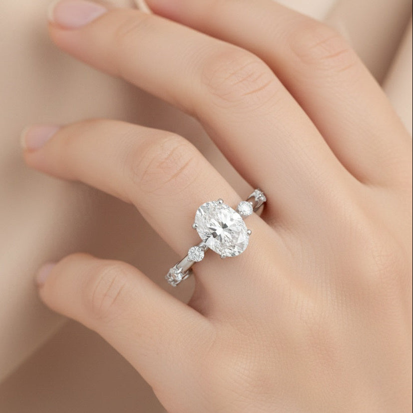 The Luminous Orbit: 1.2ct Oval Moissanite Accent Promise Ring