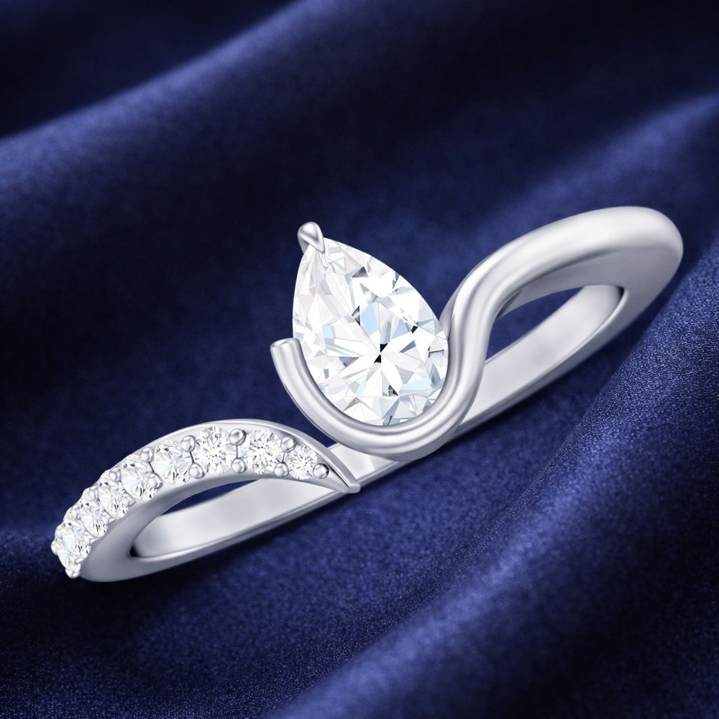 The Fluid Pear: Contemporary Bypass Moissanite Ring