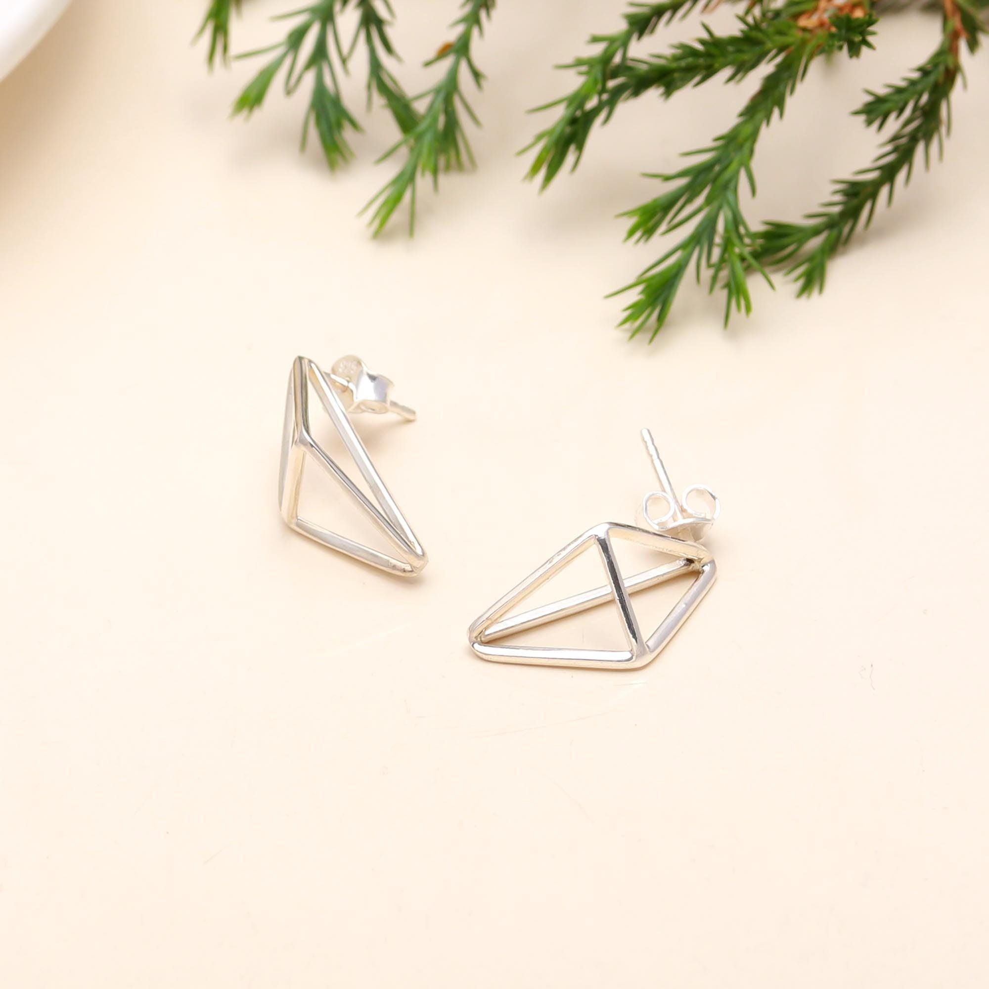 The Silver Apex: Geometric 3D Prism Stud Earrings