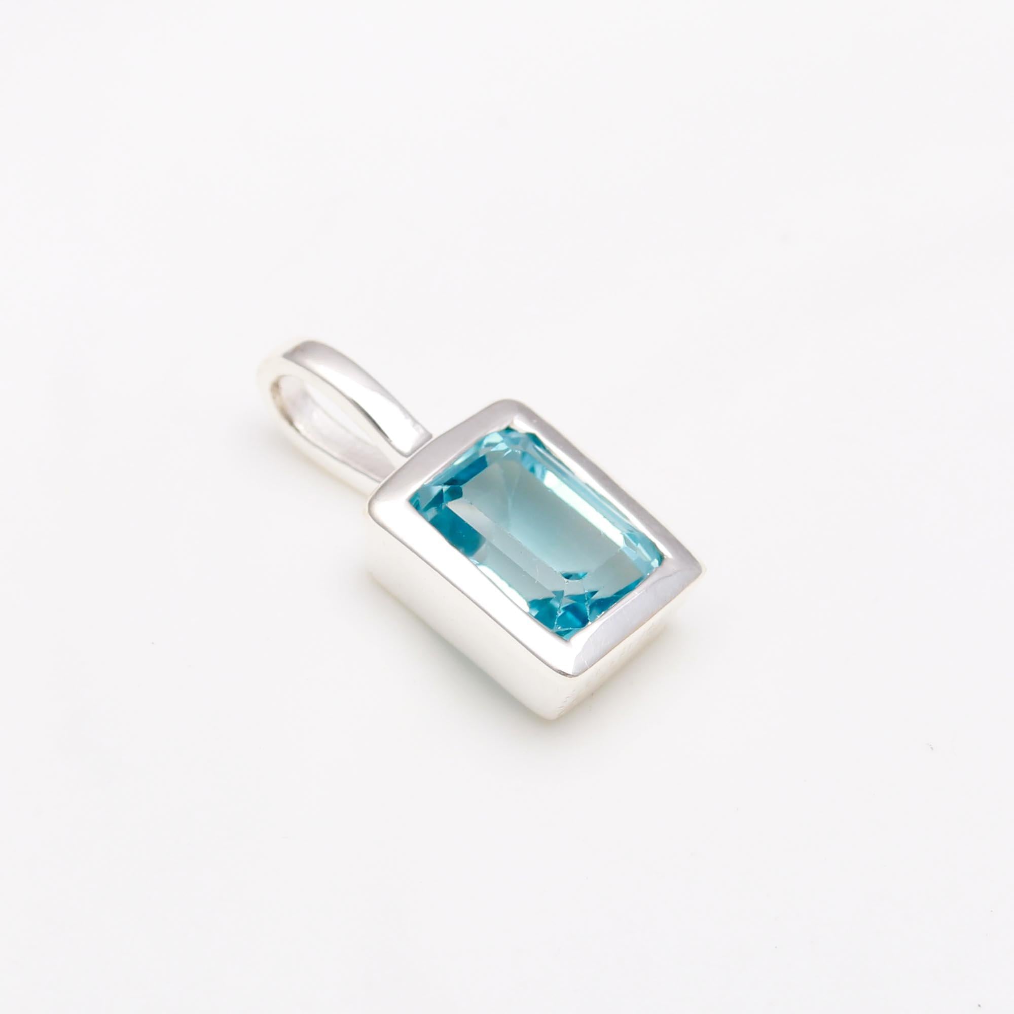 The Azure Prism: Blue Topaz Rectangular Silver Pendant