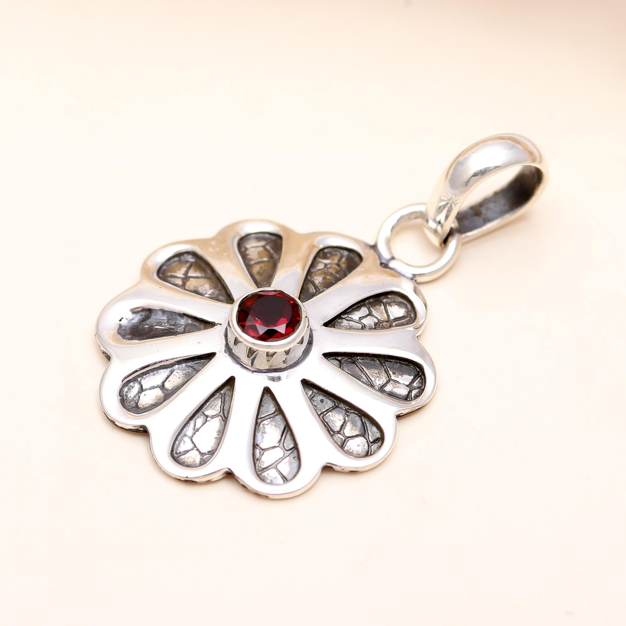 The Textured Blossom Pendant: Textured Silver Garnet Flower Pendant