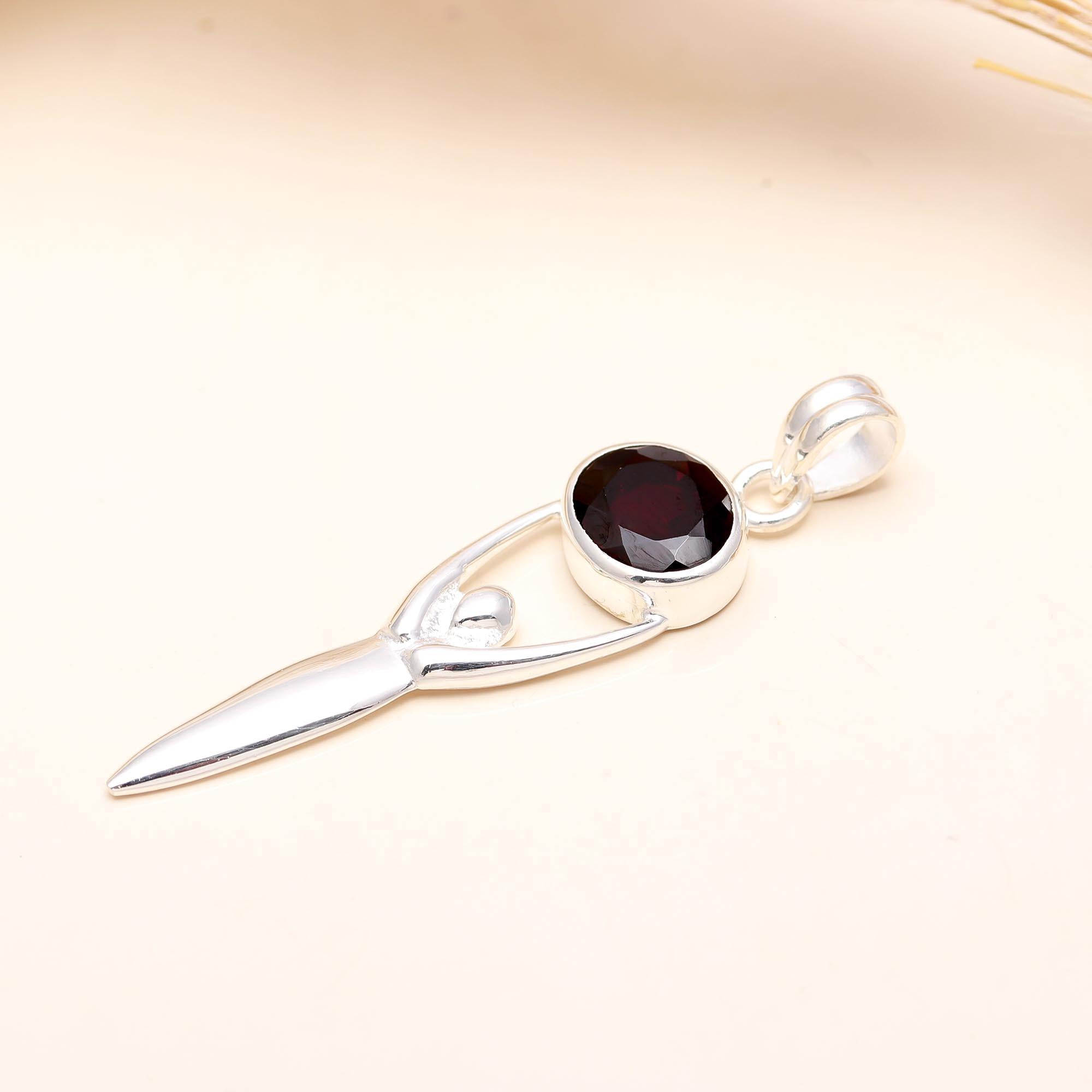 The Abstract Goddess Pendant: Stylized Garnet Figure Pendant