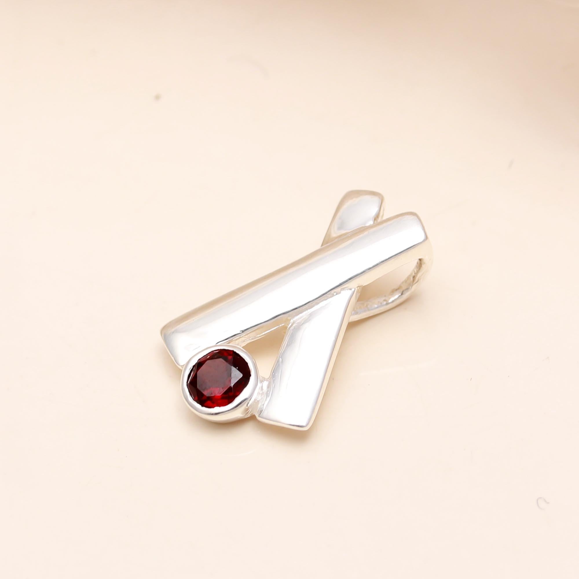 The Geometric Cross: Garnet X-Shape Slide Charm