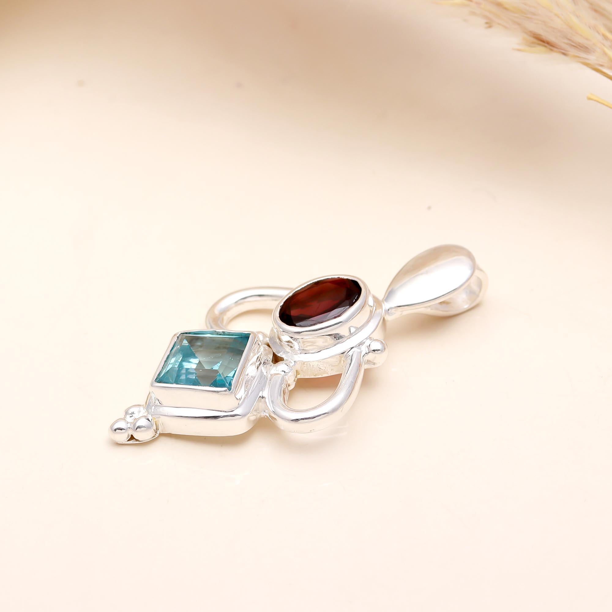 925 Sterling Silver with Blue topaz & Garnet Pendant